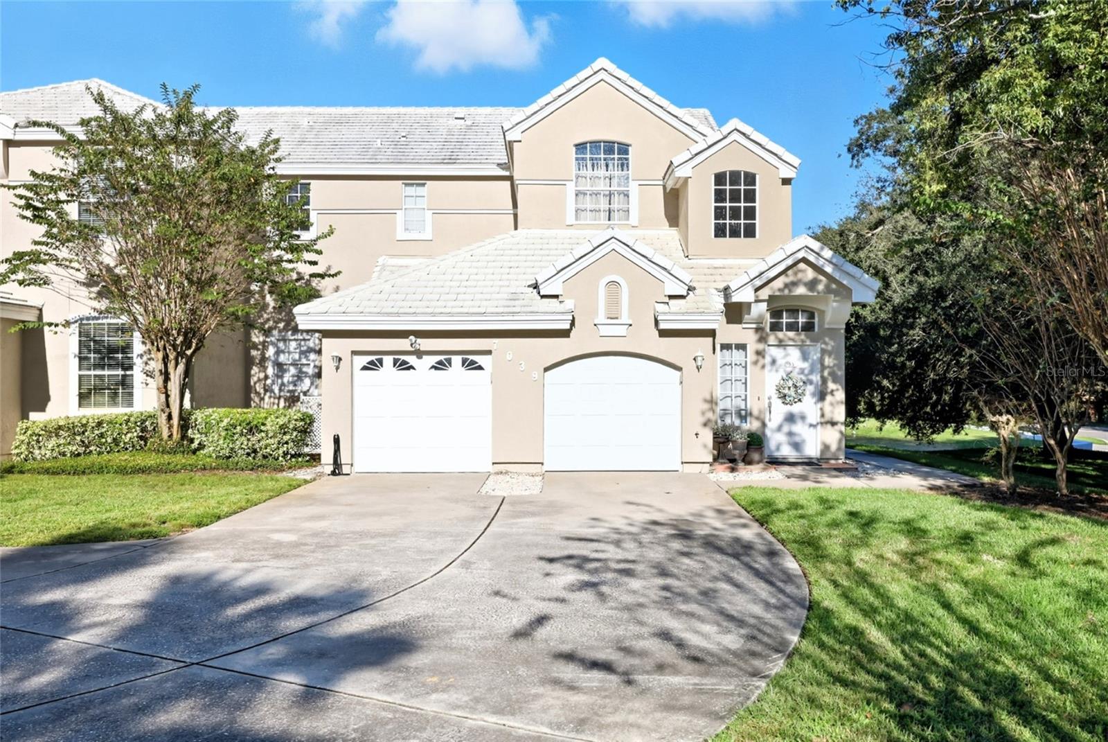Welcome to this charming and move-in-ready corner unit located in one of Orlando’s most desirable neighborhoods. This 2-bedroom, 2-bathroom condo offers the perfect blend of comfort, style, and convenience.

Step inside to a beautiful, oversized staircase that creates a grand entrance into your home. Enjoy the airy open floor plan featuring brand-new luxury vinyl plank flooring throughout main living area and bedrooms. The spacious living area opens to a private balcony with peaceful pond views—ideal for morning coffee or evening relaxation.

The home also features a dedicated laundry area and your very own oversized one-car garage with generous built-in storage—perfect for keeping things tidy and organized.

You’ll love being just a short walk away from the renowned shopping, dining, and entertainment options that Dr. Phillips is famous for. Whether it’s a quick bite at Restaurant Row or a day of retail therapy, everything is right at your fingertips.

Don’t miss your chance to own this adorable condo in an unbeatable location—schedule your private showing today