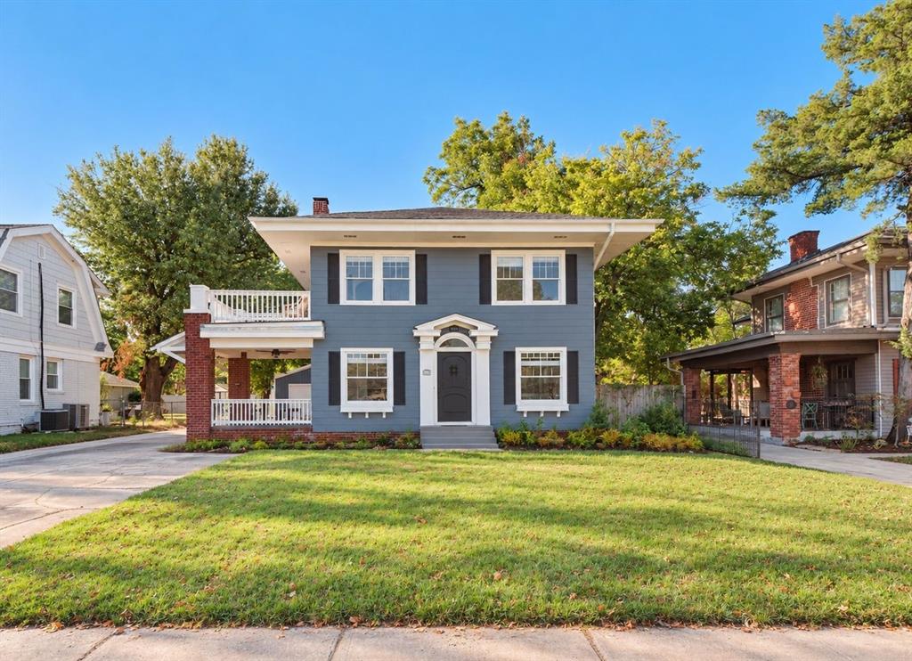 Located in the heart of historic Gatewood, just moments from the vibrant Plaza District, this beautifully updated two-story home blends timeless architectural character with thoughtful modern improvements. Striking curb appeal, mature trees, and a welcoming covered side porch set the tone for this charming property. Inside, original-style hardwood floors, abundant natural light, and a spacious living room with a fireplace and beautiful built-ins create a warm and inviting atmosphere. The adjoining formal dining room flows into a well-appointed kitchen featuring updated cabinets, granite countertops, stainless steel appliances, a gas range, and an additional nook for dining. The main level also offers a spacious laundry room, convenient powder bath for guests, and basement access. Upstairs, flexible spaces provide multiple options for bedrooms, a home office, or additional sitting areas. Both full bathrooms have been beautifully renovated, including the primary bath with a walk-in shower and double vanities. The inviting primary suite features a newly added walk-in closet and an adjoining sitting area complete with a fireplace and direct access to the expansive second-story balcony. Featuring composite decking, this impressive outdoor retreat offers the perfect setting for relaxing or entertaining. Thoughtful improvements include interior and exterior paint, renovated bathrooms, and updated lighting and fixtures just to name a few. Outside, enjoy a spacious, fully fenced backyard shaded by mature trees, established landscaping, a generous driveway, and a detached two-car garage. Ideally situated near the Plaza District's popular restaurants, boutiques, galleries, and entertainment, with convenient access to Midtown, Uptown 23rd, and downtown Oklahoma City. This exceptional home offers the perfect combination of historic charm, modern comforts, and urban convenience in one of OKC's most beloved neighborhoods.