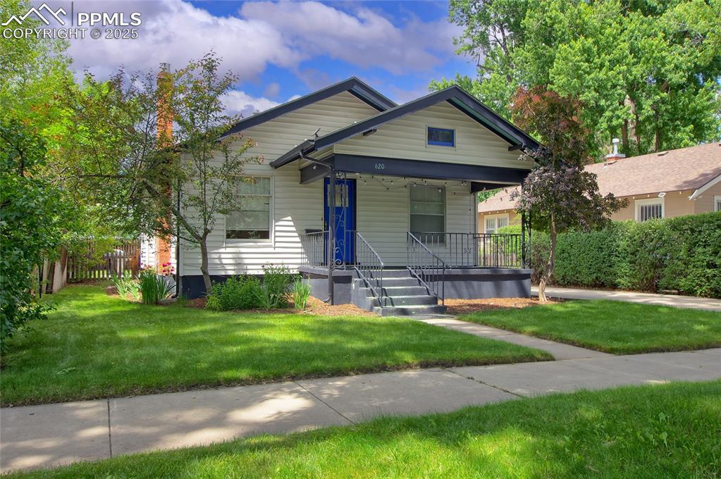 Located on a picturesque, tree-lined street, in the heart of Patty Jewett, this beautifully updated 1920's bungalow offers timeless character, thoughtful upgrades and prime location just minutes from downtown, golf, shopping, restaurants & schools*Private & fenced yard with mature landscape, a large storage shed (could be converted to a garage) & an extended driveway offers ample off street parking*Bright & sunny home features open concept & efficient floor plan*Step through the charming covered front porch into a warm & inviting living space featuring hardwood floors & anchored by a gas log fireplace - perfect for cozy Colorado evenings. Sunny dining area situated between the kitchen & living room*Kitchen with ample cabinet space, hardwood floors & walkout to backyard*Home offers two main level bedrooms that share a renovated full bath with a claw foot tub*Sun room in rear of home is a multi-functional space is a perfect office, studio, or 3rd bedroom*Laundry in basement*Sweat equity opportunity - finish the basement and add a 3rd bedroom, guest suite or second family room. Storage closet*Walkable to parks, coffee shops & some of the city's most beloved amenities, this is a rare opportunity to own a home in one of Colorado Springs' most historic and sought after neighborhoods*Newer electric panel, vinyl siding, insulation added to walls & ceilings in sunroom