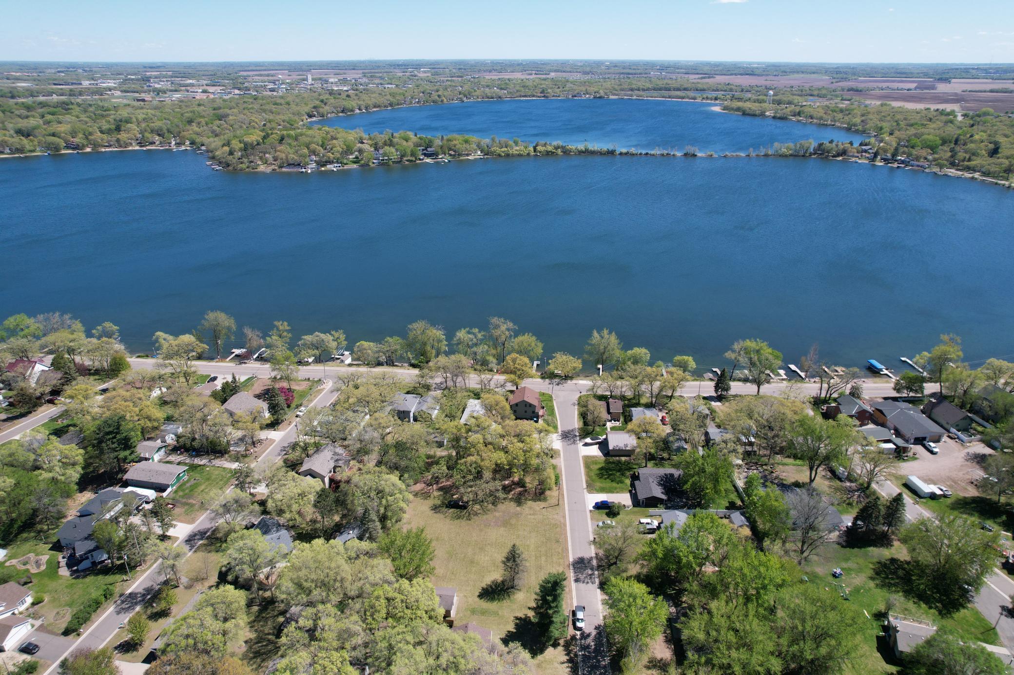 Rare opportunity in a prime location just one lot off beautiful Lake Mitchell, with easy access to Big Lake! Tucked away on a quiet dead-end street, this versatile property offers endless possibilities for builders, investors, or anyone looking to create their dream retreat. The parcel has been owner-platted into four potential lots (legal needed), offering excellent development potential. The land is mostly level and build-ready, with mature trees along the south end providing a scenic, private backdrop. An existing garage is positioned on the north side of the property, adding immediate utility and storage options. Water and sewer are already available on two of the platted lots, making the path to development even easier. The Lake Mitchell boat launch is located just one mile away and is city-owned, offering convenient lake access exclusively for City of Big Lake residents. Whether you're envisioning a custom lake-area home, multiple new builds, or an investment opportunity, this property delivers flexibility, location, and outstanding potential near the water.
