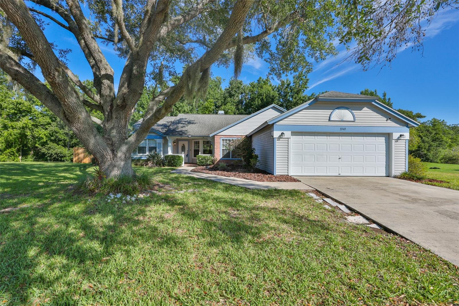 Welcome to the beautiful Walden Lake community!Nestled on a quiet cul-de-sac, this charming storybook home offers comfort, character, and plenty of space to enjoy. Featuring 1,910 square feet, this split floor plan includes 4 bedrooms and 2 bathrooms, providing ample room for both everyday living and entertaining.Recent updates include newer windows in all bedrooms, the guest bathroom, and the primary bedroom's main window. The kitchen features newer appliances, and the home also includes a washer and dryer for added convenience. Enjoy your morning coffee/tea on the covered front porch or unwind in the screened lanai overlooking the spacious conservation backyard, offering privacy and peaceful views of nature. Whether you're grilling, entertaining, or simply relaxing, this outdoor space is ready to be enjoyed.Your new adventure begins right outside your door. Walden Lake offers an exceptional lifestyle with walking trails, playgrounds, dog parks, a sports complex, and community events throughout the year. There truly is something for everyone to enjoy.
