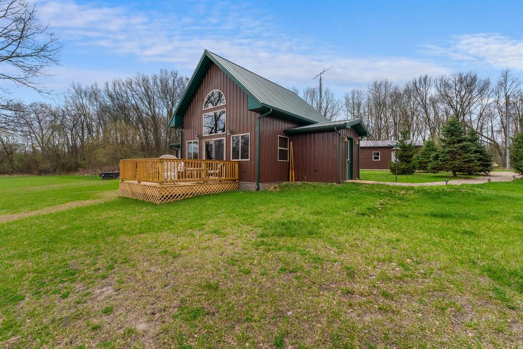 A uniquely self-sufficient cabin with 6.48 acres, featuring a stocked pond with aerator, offering excellent fishing right on the property, along with an insulated  20 x 30 garage with solar panels and grid tied inverter, a 20 x 40 pole barn with concrete floor.  Fruit trees, nut trees, berries, and dedicated garden space for sustainable living.The land supports abundant wildlife, with frequent deer sightings and a strong history of successful seasonal hunts. A mix of natural cover, open space, and ample food sources, along with the pond, creates an ideal setting for both outdoor recreation and self-sufficiency.A must see!!! Come and experience the beauty of nature and enjoy the view from the deck.