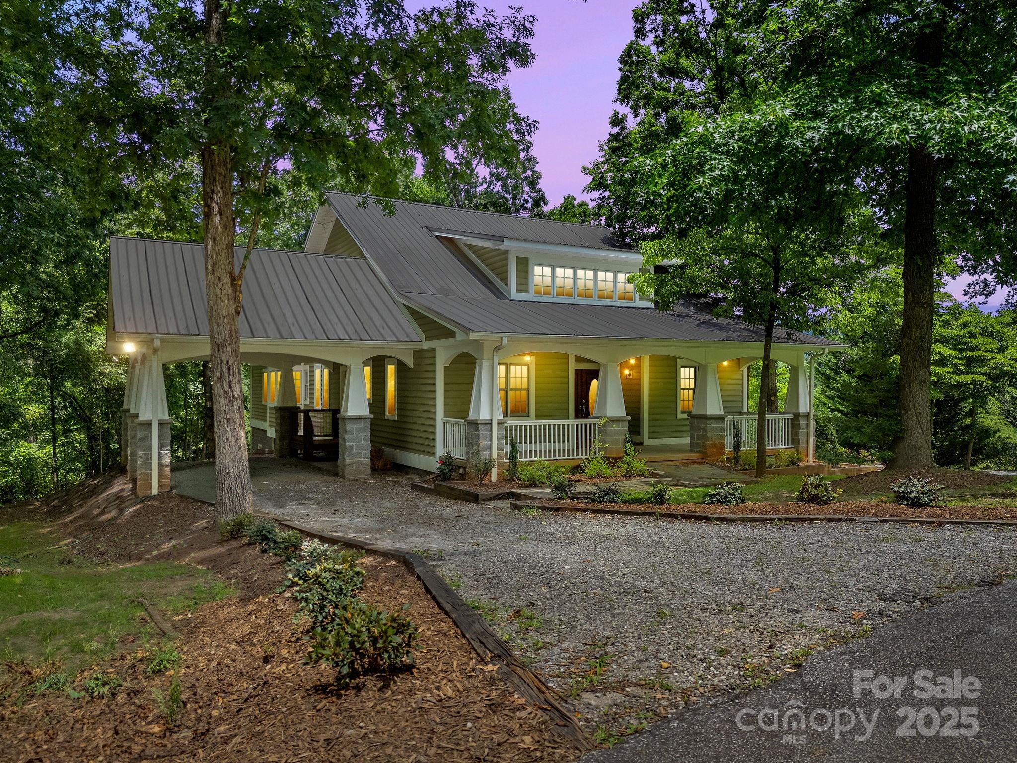 Exceptional Craftsmanship Meets Mountain Elegance. Just around the corner from the heart of Tryon, this custom-built Arts & Crafts home offers elevated living on 2 lots totaling 1.09 acres. Meticulously engineered, the home exudes quiet strength & modern sophistication. Boasting 3BR/4BA & a massive unfinished basement, home was designed w/ both comfort & versatility in mind. Step out onto the screened porch & cantilevered deck for a seamless indoor-outdoor experience that showcases winter mtn views. A chef’s kitchen w/ high-end finishes opens to lvg & dining areas w/ custom features - huge fireplace & wet bar . The upstairs space offers so many opportunities - full bath, covered porch, & plumbed for a 2nd wet bar to transform the space into an entertaining showcase.?RV hook-up for visiting guests or adventure-ready convenience. Spa-inspired bathroom.?Minutes to boutique shops, dining, galleries, & cultural events. Enduring quality. Thoughtful design. This is mountain living redefined!