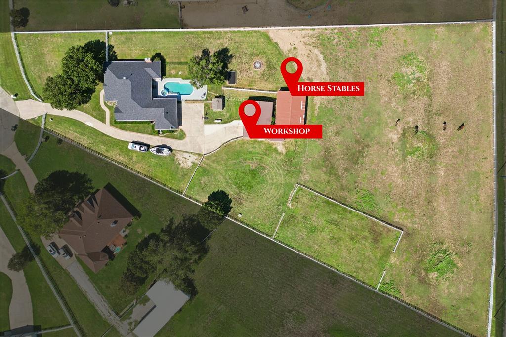 2.75 ACRES OF UNMATCHED PARADISE IN A PRIVATE GATED COMMUNITY WITH A WORKSHOP & HORSE STABLE! Set on 2.75 acres in a private, established gated community, this stunning 4-bedroom, 2.5-bath home offers the perfect blend of modern comfort and country charm. The property includes a sparkling pool and spa, a 30x60 workshop with electric, and a 4-stall stable—ideal for hobbies, horses, or extra storage.

Inside, the home welcomes you with hardwood floors, soaring ceilings, crown molding, recessed lighting, and an open, sun-filled layout. The chef’s kitchen is a true showpiece with Quartz countertops, two-toned cabinetry, a large center island, top-of-the-line stainless appliances, 5-burner gas cooktop with a pot filler, and open views into the expansive living room featuring a wood-beamed ceiling, built-in surround sound, and a wall of windows overlooking the pool and acreage. A nearby game room with a wood-burning fireplace and private half bath adds flexibility for entertaining.

The master suite offers a private retreat with a bonus room—perfect as an office, sitting area, or extra closet—tucked behind sliding barn doors. The spa-like ensuite features dual vanities and a walk-in shower with bench, 4 body sprays, and dual showerheads. Three additional bedrooms, each with walk-in closets, are thoughtfully split for privacy.

Outdoors, the resort-style patio with a built-in grill sets the stage for gatherings, while the pool, workshop, and stable complete this impressive acreage. All of this in a serene, rural-feel community just minutes from shopping, dining, entertainment, Texas Motor Speedway, and Downtown Fort Worth.