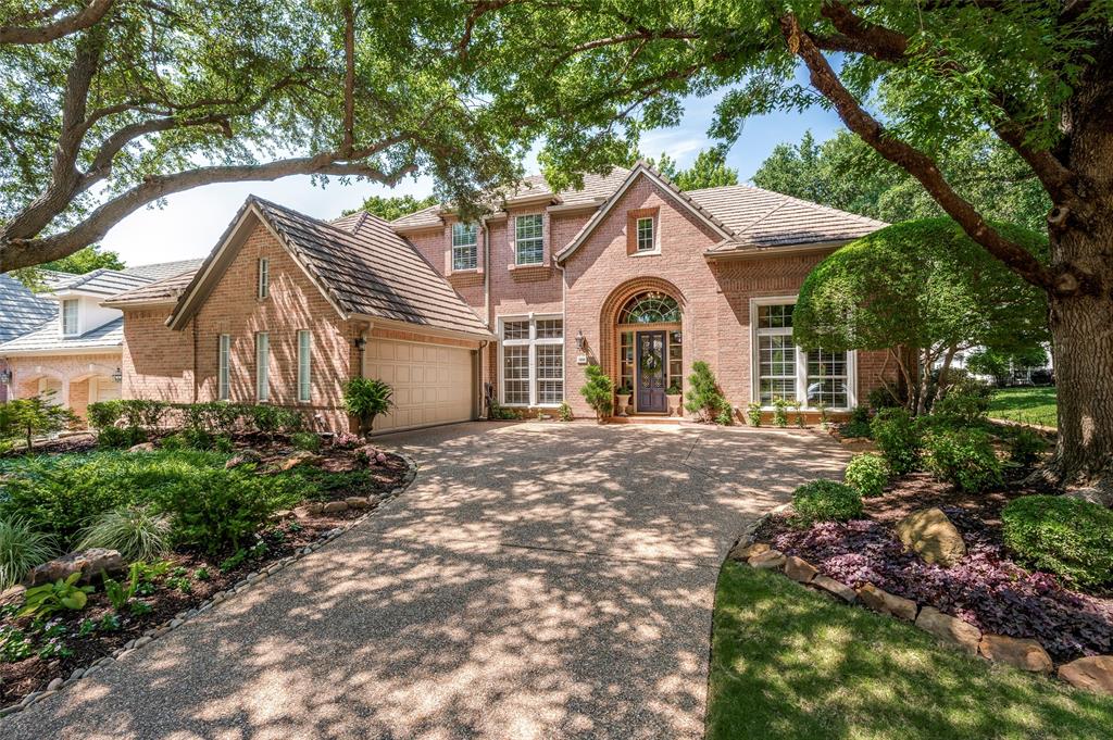 Open Sat 2-4 & Sun 3:30-5:30! Nestled inside prestigious gated-guarded Stonebriar Village, this former Darling model home offers a rare blend of luxury~tranquility~timeless elegance on a spacious corner cul-de-sac lot surrounded by a peaceful creek w-fountain views. Framed by lush professional landscaping & a canopy of mature shade trees, the setting feels like a private retreat in the heart of the city. A grand two story entry welcomes you w-a sweeping wrought-iron staircase~stunning chandelier~extensive custom millwork~rich wood flrs. The open-flowing flr plan features the primary suite & a private guest suite downstairs, w-two addt'l bdrms, a bath & loft area, currently being utilized as a study, upstairs. The formals are filled w-natural light & elevated by plantation shutters~crown molding~elegant lighting & refined architectural details. The gourmet kit boasts granite ctops~a large island w-pendant lighting~open shelving~white cabinetry~Sub-Zero refrigerator~SS appl~expansive breakfast bar & thoughtful storage. Open to the kitchen, the vaulted family rm is designed to impress w-picture-frame molding~built-ins~a gas fp~a wall of windows showcasing serene water & tree-lined views. Nearby, the brkfst nook overlooks the heavily treed bkyrd & babbling creek. The luxurious primary suite offers a tranquil sitting area~bay windows w-backyard views~extensive crown molding~tiered ceilings. The spa-inspired bath features marble flrs & ctop~ jetted tub~OS seamless glass shower~vaulted beamed ceiling~dual vanities~an oversized WI closet.  A separate downstairs guest suite features high ceilings~custom finishes~large closet~full bath~panoramic water views. An elegant staircase leads to a spacious loft area~massive WI attic storage & two generously sized bdrms, each featuring WI closets & sharing a beautifully appointed bath. The north-facing bkyrd is truly a sanctuary complete w-a patio overlooking the creek & illuminated fountains-an idyllic place to relax & unwind.