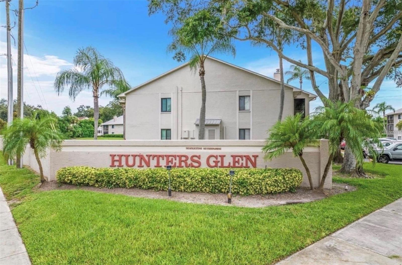 Turn-key and beautifully updated with over $30,000 in upgrades, this first-floor condo in the desirable Hunters Glen community offers stunning pond views and a truly modernized feel. Inside, you'll find gorgeous quartz countertops, shaker cabinets, ample kitchen storage, and an extended countertop that provides extra prep and entertaining space. The kitchen also features a brand-new oven with built-in air fryer functionality. Additional upgrades include a new washer and dryer, a new lanai roller shade, and USB-equipped outlets throughout for added convenience. Residents enjoy a heated community pool year-round, along with cable, water, trash, exterior maintenance, and professional community management, making for easy, low-maintenance living. Ideally located between Palm Harbor and Downtown Dunedin, this well-maintained community has convenient access to shopping, dining, and everything the Florida lifestyle has to provide. With only four units each floor, the building maintains a welcoming, neighborhood feel. Additional highlights include a designated parking space and a private storage unit conveniently located just outside your front door, perfect for keeping seasonal items neatly tucked away. Don’t miss your chance to make this beautifully updated condo your own. Schedule your showing today!