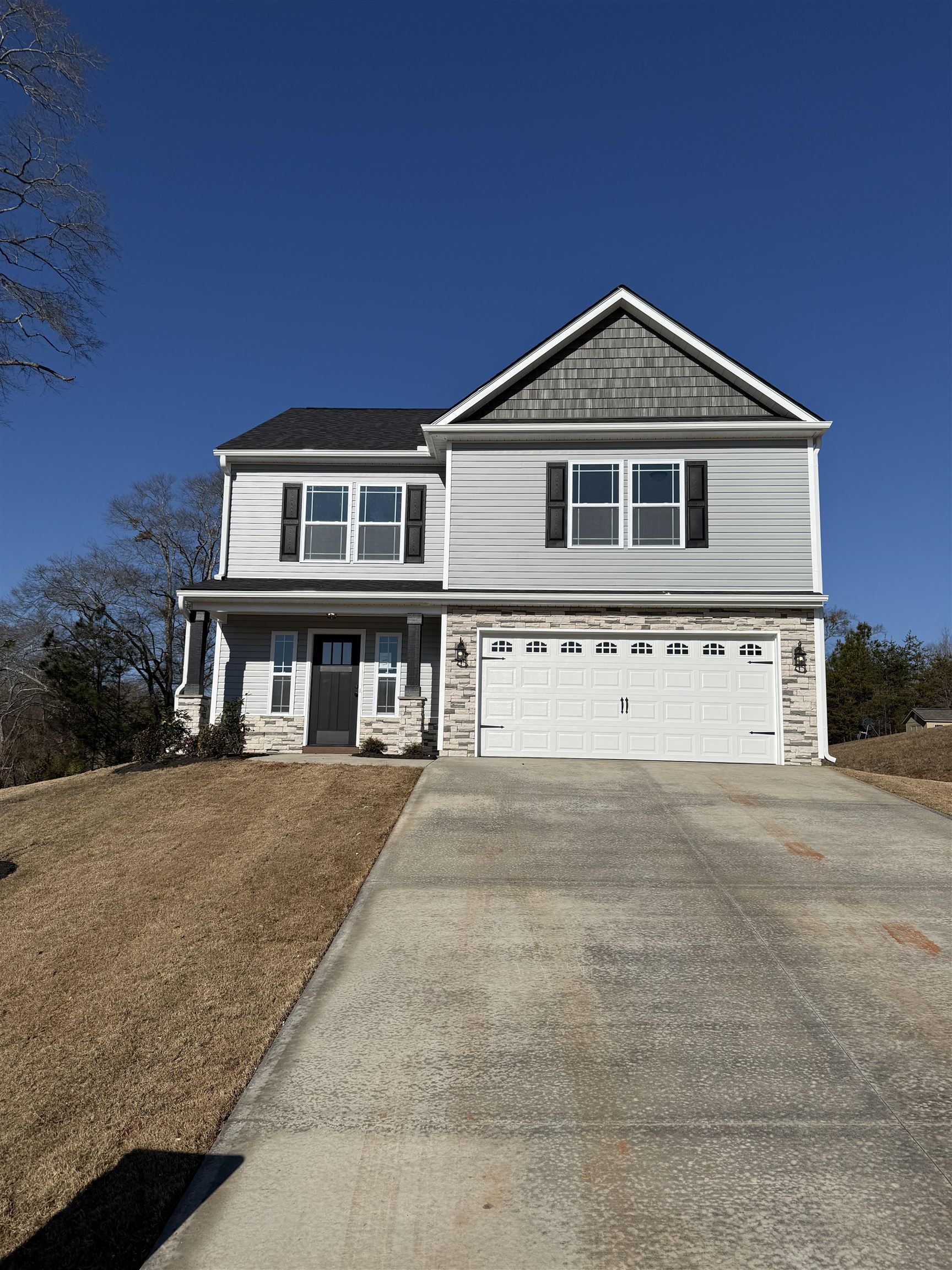 Builder Incentive of $7,500 available! Welcome to the Heatherwood floor plan. This spacious 4 bedroom, 2 1/2 bathroom home sports several upgrades including a sunroom, luxury vinyl plank flooring, painted cabinets, and more! Situated on over half an acre lot in the new Fall Creek community in Inman. Call today for more info!