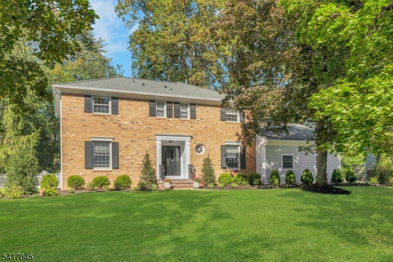 Classic Colonial charm meets everyday comfort in this beautifully maintained home in thesought-after Wickham Woods section of Chatham. With 4 spacious bedrooms and 3.5 baths, thisinviting residence offers plenty of room to grow, gather, and create lasting memories.The sun-filled family room, centered around a cozy fireplace, is the perfect place to unwind atthe end of the day, while the formal dining room sets the stage for holidays, celebrations, andspecial moments with family and friends. Upstairs, the serene primary suite provides a peacefulretreat, complete with a private en-suite bath and generous closet space. The additional bedroomsare comfortably sized, offering flexibility and ample storage throughout the home.A versatile first floor living space ideal as a den, home office, or guest iscomplemented by a full bath, providing comfort and convenience for extended living area or visitors.The full basement opens the door to endless possibilities, whether you envision a recreationroom, home gym, or additional living space tailored to your needs.Step outside to enjoy the home's very private backyard, featuring a patio tucked away for quietrelaxation, as well as a second patio just off the house with an awning,  perfect for outdoordining and entertaining. A welcoming mudroom entry and two-car garage add to the home& #39;severyday practicality. All of this is nestled in one of Chatham's most desirable neighborhoods  a place you'll be proud to call home.