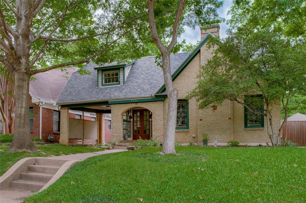 Tucked into one of Kessler Park’s most beloved and walkable enclaves, this delightful Tudor in Kessler Square is the kind of home that instantly feels warm, welcoming, and deeply rooted in the neighborhood around it. Known for its friendly front-porch culture, charming architecture, and unbeatable proximity to all the best of Oak Cliff, Kessler Square offers a lifestyle that’s as connected as it is picturesque. A light-filled entry with a true foyer sets the tone, opening into a gracious living room rich with character — leaded glass windows, gleaming hardwoods, a wood-burning fireplace, and timeless architectural details create a space that feels both elegant and comfortable. The spacious dining room glows beneath a twinkling chandelier and flows effortlessly into the sweet eat-in kitchen, complete with a cozy breakfast nook, oversized butler’s pantry, and an easy, functional layout designed for both everyday living and gathering with friends and family. The first floor offers two bedrooms plus a flexible office or nursery space, along with two full baths. Upstairs, an expansive bonus area invites endless possibilities — ideal for multiple home offices, a media lounge, creative studio, or private retreat. Thoughtfully maintained, the home features 2026 updates including a new roof and upstairs HVAC system, offering peace of mind alongside the home’s undeniable charm. Beloved for its strong sense of community and sought-after Rosemont zoning, Kessler Square offers a rare blend of charm, connectivity, and convenience — just minutes from Bishop Arts, Downtown, and the Medical District. Rosemont Upper was recognized as a 2023 National Blue Ribbon School, further elevating the neighborhood’s longstanding appeal. Full of character, flexibility, and heart, this is a home that evolves beautifully with the people living in it.
