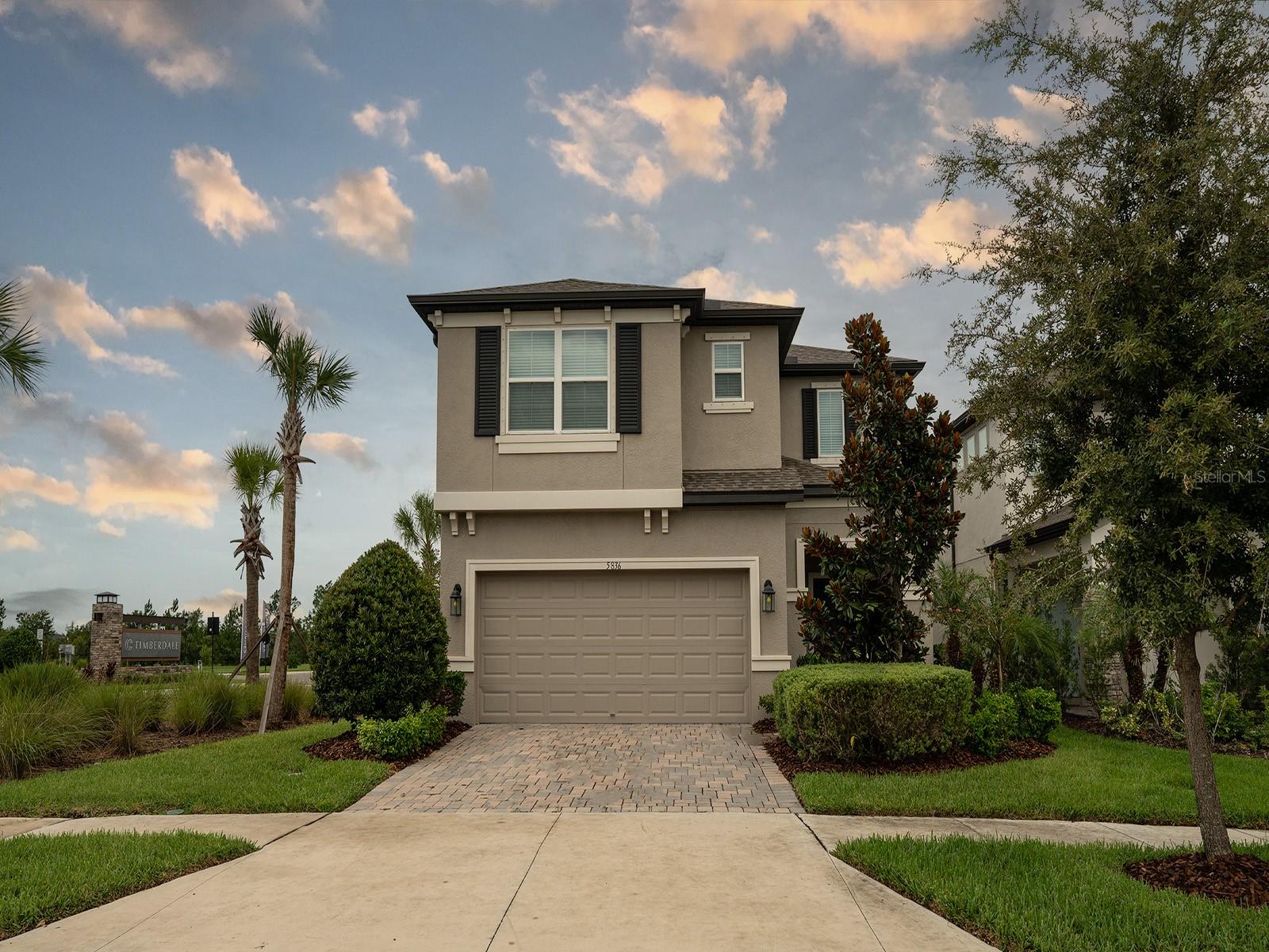 Experience exceptional living in this spectacular corner-lot home in Chapel Crossings, a vibrant new community designed for comfort, convenience, and style. The standout outdoor retreat features a CUSTOM-BUILT HEATED SALT-WATER SPORTS POOL WITH A SUN SHELF FOR BEACH CHAIRS, A SCREENED ENCLOSURE, AND ITS OWN CLEANING ROBOT.  With more than $100K in upgrades, this home offers valuable peace of mind with a Generac Power Rush generator setup, an exterior generator connector, hurricane shutters, a modern alarm system, private fencing for tranquil outdoor living, and a water softener for fresh, high-quality water throughout.  Inside, the chef-inspired kitchen includes a dual oven, glass stovetop, 42-inch cabinetry, stainless steel appliances, a spacious island, and stunning quartz countertops.  Upstairs, a flexible loft provides the perfect space for a home office, study area, or additional lounge.  The home also features a versatile laundry room with a utility sink, a spacious main-bedroom walk-in closet, stylish epoxy garage flooring, and a beautifully paved driveway.  Ideally situated just minutes from shopping, dining, parks, and major roadways, this outstanding residence offers the perfect blend of luxury, comfort, and everyday convenience.  Schedule your private tour today!