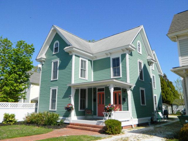 Cape Charles DUPLEX centrally located in the Historic District. Beautifully restored duplex  featuring and up and down style. Handsome architectural features thru out include gleaming pine floors. Two units each with modern kitchens with corian counters and stainless steel appliances, open floor plans, hardwood floors, tile bathrooms and two bedrooms. Second floor unit has spacious 3rd floor bunk room. Both are virtually identical and have separate entrances. Each unit conveys appliances. Located only a few blocks from the beach and a block away from shops and restaurants with a backyard and off street parking this makes it the perfect vacation rental. Imagine enjoying Cape Charles while still generating income from the other unit or taking full advantage of income from both sides!
