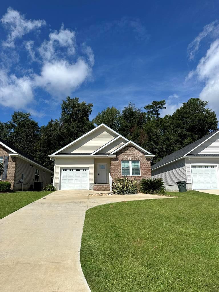 Welcome to 116 Huntington Pointe Drive— located in the heart of Thomasville, Georgia in a 55 and older community. This 3-bed/2-bath offers 1500 sqft of comfortable living space and is the definition of easy maintenance free living. . Enjoy a well-kept kitchen with a brand new electric range and refrigerator, a dedicated laundry room with new washer/dryer, and an attached garage. Sitting on a 0.17 acre lot, this property also includes a rear patio pad. Yard maintenance is covered by the HOA fees. Conveniently located across the street from Publix and Lowe's and 10 minutes from Downtown Thomasville, restaurants, shopping, and entertainment.