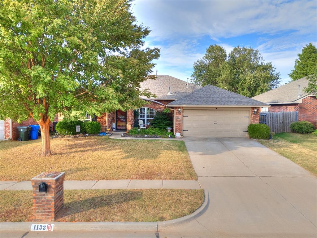 Welcome to this inviting 4-bedroom, 2-bathroom home offering 1,828 square feet of comfortable living space in the highly sought-after Eagle Cliff neighborhood of Norman. This home features a smart, functional layout that balances open living areas with well-defined spaces, creating an easy flow that works beautifully for everyday living and entertaining alike. Step inside and you’re greeted by durable hard flooring in all the high-traffic areas, giving the home a clean, modern feel while making maintenance a breeze. The spacious living room centers around a cozy corner fireplace with a striking mantle — the perfect spot to gather with friends or unwind on cool Oklahoma evenings. Large windows bring in plenty of natural light, keeping the interior bright and welcoming throughout the day.  The kitchen is designed with both style and function in mind, complete with stainless steel appliances, generous counter space, and plenty of cabinetry for storage. It opens conveniently to the dining area, allowing for easy conversation and connection during mealtime or when hosting guests. Each of the four bedrooms offers ample space and flexibility — whether you need room for a home office, guest room, or a comfortable retreat at the end of the day. The bathrooms are bright and airy, featuring fresh finishes that add to the home’s inviting character. An indoor laundry room adds convenience and keeps chores tucked neatly out of sight. Out back, you’ll find a fantastic outdoor space that’s perfect for relaxing or entertaining. The patio features charming checkered pavers, a storm door for easy access, and a generous amount of covered space — great for grilling, hosting gatherings, or simply enjoying Oklahoma’s beautiful evenings. Located in one of Norman’s most desirable areas, this home offers quick access to Highway 9 and is just a short drive from the University of Oklahoma, local shops, and restaurants. It’s the ideal blend of comfort, convenience, and charm!