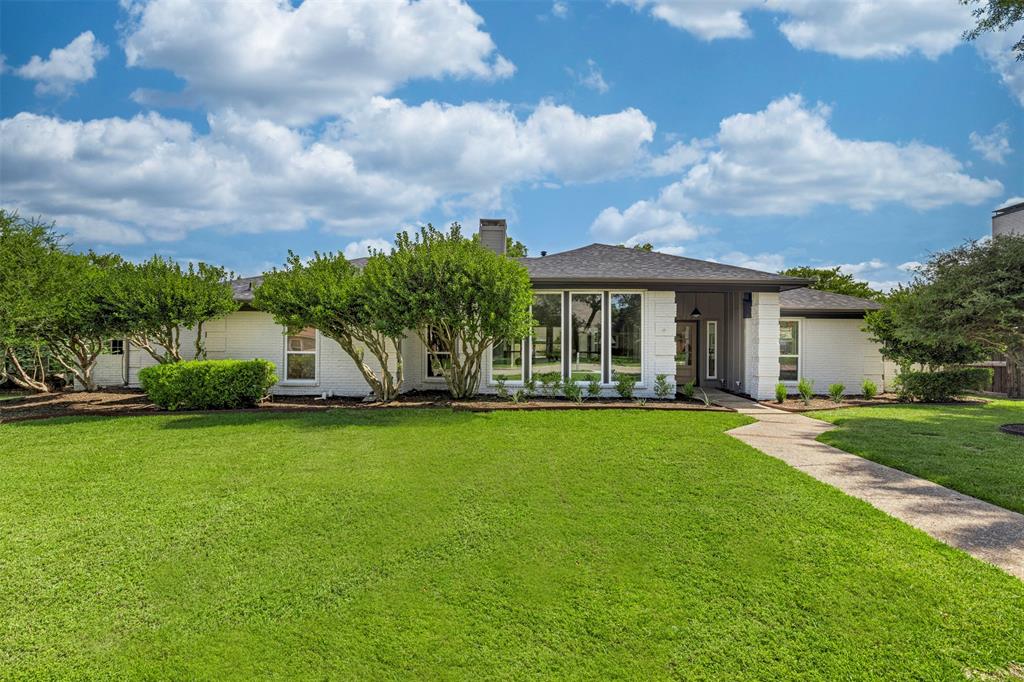 Welcome to 3512 Harpers Place, Plano, TX—a stunning showcase of modern elegance and contemporary design. This impeccably renovated home offers a regal curb appeal that invites you to explore its luxurious interiors. As you step inside, you're greeted by high, beamed ceilings and a luminous atmosphere created by picturesque windows that flood the living spaces with abundant natural light. The elegant wainscoting and designer paint selections add a sophisticated touch, while built-ins provide both functionality and style. This exquisite home features three spacious bedrooms and three full baths, including a primary suite that serves as a sanctuary, boasting a luxurious soaking tub, separate vanities, and a separate shower, offering a spa-like retreat. The modern kitchen is a culinary dream, equipped with a gas range and highlighted by a chic tile backsplash, and ample of storage. Ceiling fans throughout the home ensure comfort and energy efficiency. For dining options, choose between the elegant formal dining area or the casual breakfast area, both thoughtfully designed to cater to your hosting needs. A sunroom offers a serene spot for relaxation, perfect for enjoying quiet mornings or afternoon reads. Step outside to discover the sparkling pool, a centerpiece of outdoor living, promising endless summer enjoyment. This home is truly a masterpiece of design and comfort, ready to welcome you with open arms. Experience the blend of modern amenities and timeless elegance at 3512 Harpers Place—a place where your dream lifestyle awaits.