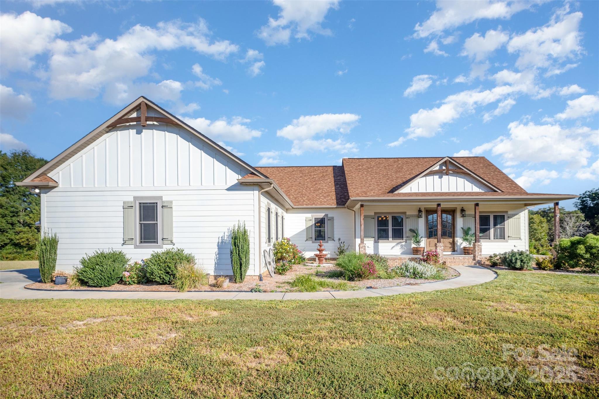 Welcome to your dream retreat on 1.40 acres! This one-of-a-kind ranch-style home has been thoughtfully designed and meticulously maintained, offering timeless character and modern comfort. From the charming covered front porch with double Southwood entry doors to the sweeping views all around, every detail has been carefully curated.

Inside, you’ll find a spacious living room with rich hickory hardwood floors, coffered ceilings, and a custom electric fireplace. The formal dining room features stained wood tray ceilings and custom cabinetry topped with black walnut countertops—perfect for hosting memorable dinners. 

The primary suite is a serene escape, boasting a spa-like bathroom and a custom walk-in closet. Step outside to unwind on the rear porch or hangout in the brand new (over 700 SF) bonus room!

With its combination of warmth, elegance, and unmatched attention to detail, this home offers a lifestyle that’s as beautiful outdoors as it is indoors. Don’t miss the opportunity to experience it for yourself—schedule your showing today!