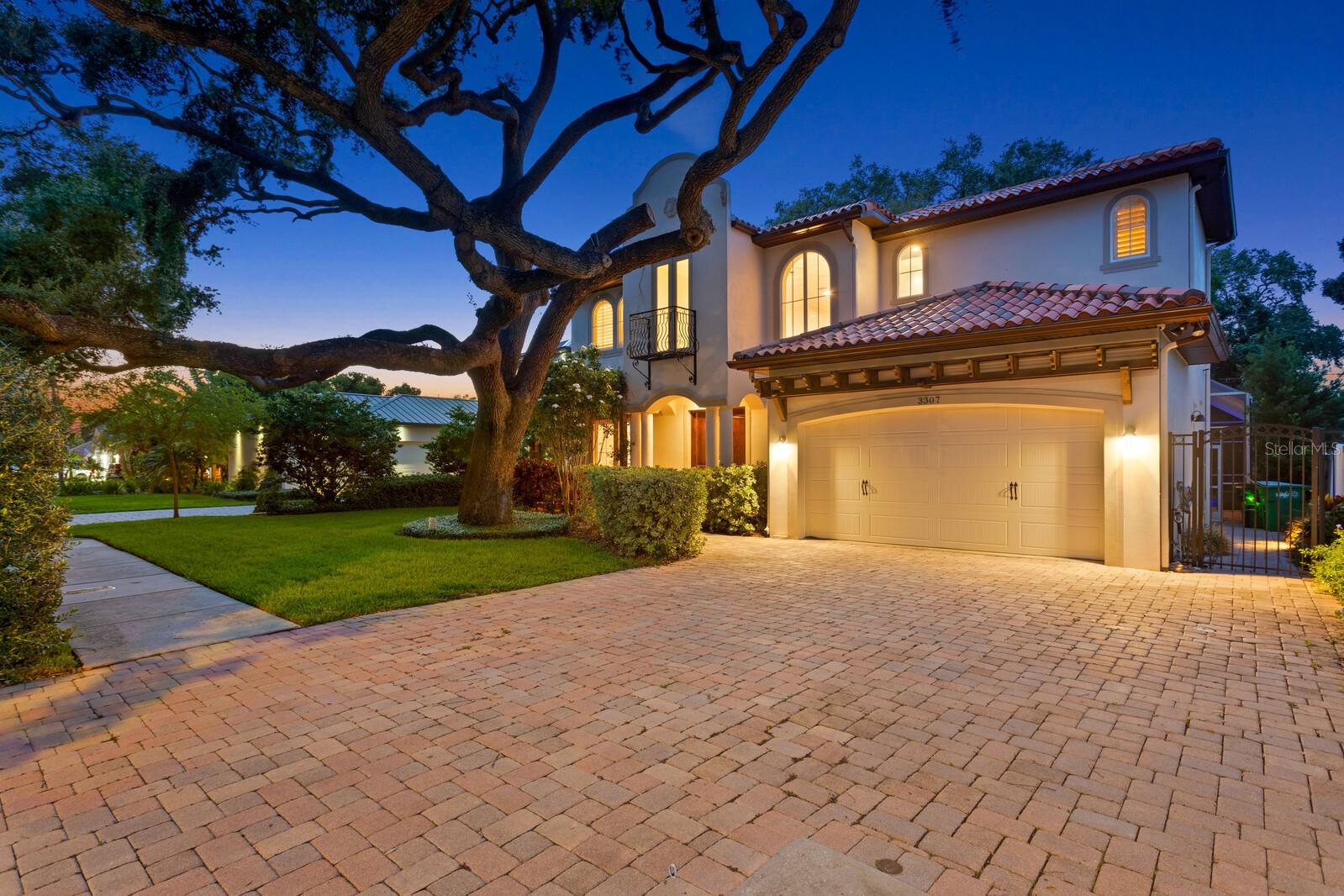 Under contract-accepting backup offers. Welcome to your dream home—ideally located in the renowned and highly desirable Bayshore Beautiful neighborhood, just a short stroll from the iconic Bayshore Boulevard. This impeccably maintained Mediterranean-style pool home blends timeless elegance with everyday comfort, offering the perfect sanctuary for modern living.
With 5 generously sized bedrooms, 4.5 baths, plus two dedicated offices (one on each level) featuring custom built-ins, this home is thoughtfully designed for flexibility—ideal for professionals working from home, multi-generational families, or those simply craving more space. There is a first floor en-suite bedroom that’s perfect for guests or in-laws. A spacious 2-car garage provides added convenience and ample storage.
Step through grand double doors into a stunning two-story foyer, where soaring 10-foot ceilings, 8-foot doors, newly refinished hardwood floors, crown molding, and coffered ceilings set an elegant tone throughout the main floor. At the heart of the home is a gourmet chef’s kitchen, featuring granite countertops, 42-inch cabinetry, stainless steel appliances with a gas range, walk-in pantry, and an oversized island perfect for gathering. The open-concept design connects the kitchen to a spacious living spaces and casual dining area creating a seamless flow for everyday living and entertaining alike.
Additional main-floor highlights include a cozy fireplace in the formal living room, a well-appointed office, powder room, and a practical laundry/utility room. Upstairs, a charming study offers a perfect nook for reading, relaxing, or working. Retreat to the luxurious primary suite, complete with a fully renovated spa-like bathroom, dual vanities, a soaking tub, walk-in shower, his and her closets.
Each additional upstairs bedroom is designed with comfort and versatility in mind—two share a convenient Jack-and-Jill bath, while another enjoys a private en-suite.
Step outside to your own private backyard oasis. Unwind by the sparkling pool, relax on the covered patio, gather around the built-in fire pit—perfect for cozy evenings under the stars or practice your swing on the personal putting green—all set against the backdrop of Florida’s year-round sunshine.
Situated in the coveted Plant High School District and just minutes from Downtown Tampa, upscale shopping, dining, and the waterfront sidewalk of Bayshore Boulevard, this move-in ready home offers an unmatched combination of location, luxury, and lifestyle.
Don’t miss your opportunity to own one of Bayshore Beautiful’s most exceptional homes.