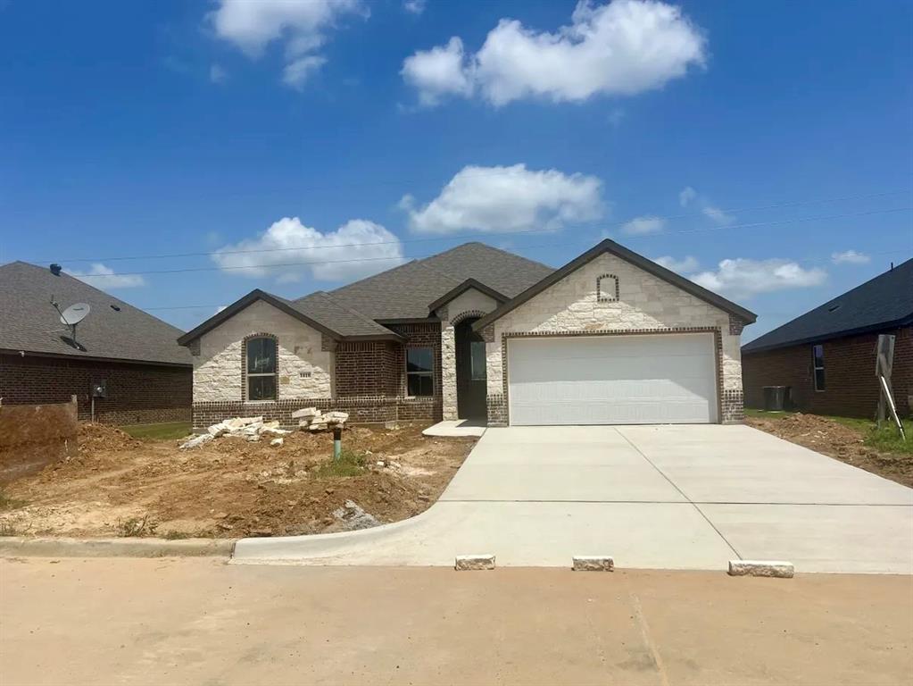 NEW CONSTRUCTION…NO HOA…TOLAR ISD Welcome to 1418 Oleander Dr. in charming Tolar, TX, another high quality home crafted by Al Couto Homes, known for delivering elegance without the ego. This 4 bedroom, 2 bathroom beauty offers 1717 square feet of smart, efficient design; wrapped in timeless curb appeal with a stone and brick exterior. A spacious 2 car garage and a wide driveway make for a grand welcome. Inside, you’ll be greeted by wood-look ceramic tile flooring throughout…zero carpet, zero hassle, and a whole lot of style. The heart of the home features a gourmet kitchen with designer cabinets, sleek granite counters, and stainless steel appliances. The open layout flows effortlessly into the cozy living area, where an electric fireplace not only adds ambiance but throws serious heat. Split-bedroom design ensures privacy and function, ideal for anyone needing a home office setup. And with no HOA breathing down your neck, you’ve got the freedom to truly enjoy your space. Front and back sod will be professionally installed this week—so yes, it’s about to look even better. Bonus: You’re in the highly desirable Tolar ISD. A small-town feel with big-time benefits. This one checks boxes, and then some.