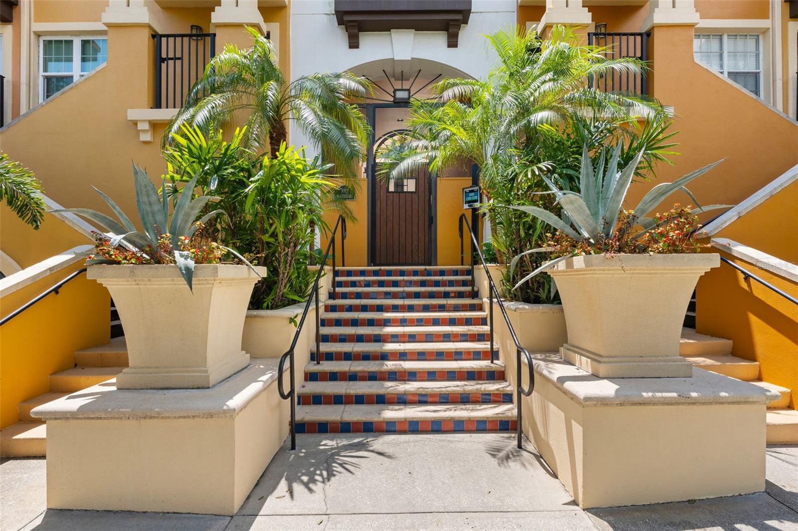 Downtown St Pete! A rare first-floor, 2-bedroom residence in one of downtown St. Petersburg's most desirable locations is now available. The open kitchen, covered balcony, and spacious bedrooms with generous closet space make this one a standout. High ceilings, recessed lighting, split bedroom plan! Breakfast Bar with Granite countertops, Master Bedroom has a large walk-in closet and the Guest room suite has a walk-in closet and close off for privacy-perfect for out of town guests! The Laundry room is off the Foyer entry! HOA fees cover cable, internet, water, sewer and flood insurance. Milestone inspection is complete with no pending assessments. Step outside and you're immediately close to the city's best cultural, dining, and waterfront attractions — from museums and theaters like the DALI and the Mahaffey to the vibrant restaurants, cafes, and boutiques of Beach Drive, sporting venues such as the Rays and Rowdies and the St Pete Pier! This location is front and center to the annual Firestone Grand Prix of St Petersburg car races! A deeded parking space in underground parking with plenty of storage for bikes and kayaks plus flexible guest parking add everyday convenience, while a cooled, private storage room houses the HVAC handler and newer water heater. Built in 2002, this low-density, professionally managed community offers a quieter downtown living experience. Residents enjoy a beautifully maintained amenity deck with a resort-style saltwater pool, heated spa, outdoor kitchen, gym, cabanas, and a lush, lighted garden perfect for evening entertaining. Whether you're searching for a primary residence or a seasonal escape, this home delivers it all.
