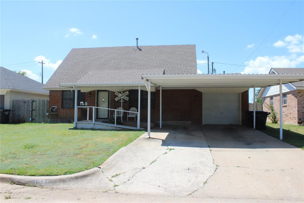 Spacious and versatile home with flexible layout — use as 1 or 2 living areas or 3 to 4 large bedrooms! This property is wheelchair accessible and features a handicap-accessible shower and ramp going into home, plus a full bath upstairs with 3 bedrooms. Enjoy cooking on the gas stove in a kitchen with ample counter space and included refrigerator. Washer and dryer also stay!
Relax on the covered front porch or back patio overlooking the large yard with a handy storage building. Additional features include a carport, 1-car garage, central heat and air, and excellent proximity to shopping, dining, and major interstates.
