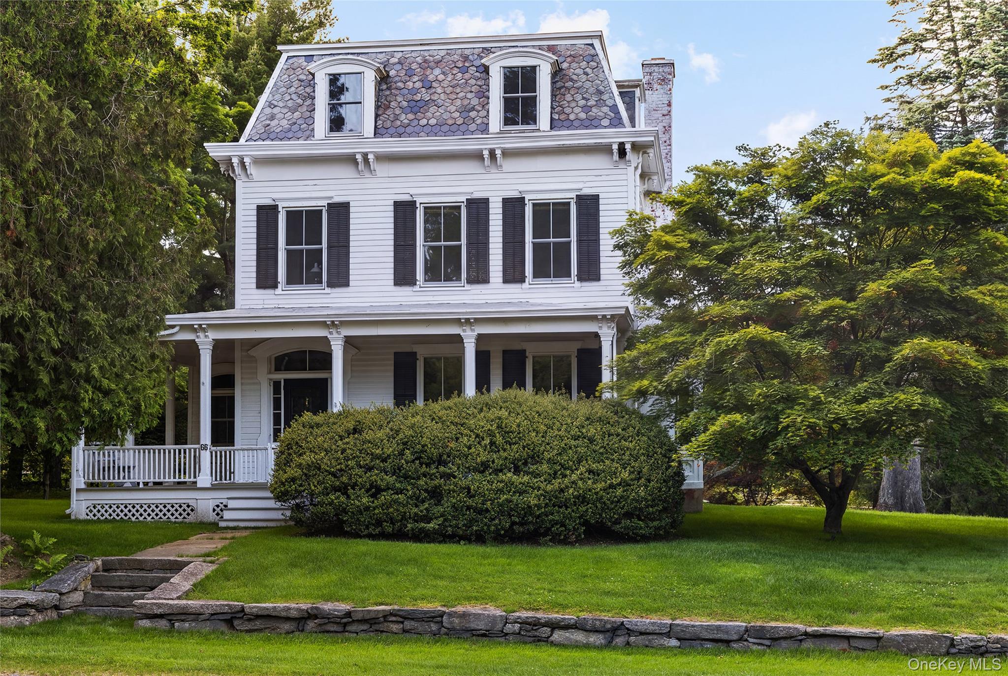 The John Kinkel House | Circa 1872Available publicly for the first time in more than 51 years, The John Kinkel House is a rare opportunity to steward one of Bedford Village’s most historically significant and architecturally distinctive residences. Built circa 1872 and prominently situated within the Bedford Village Historic District, the home is a handsome example of Victorian Second Empire architecture, distinguished by its mansard roof, arched dormers, decorative brackets, molded cornices, and elegant proportions.Set beneath a canopy of mature specimen trees, the residence retains a remarkable collection of original details, including wide-plank floors, period millwork, graceful bay windows, and beautifully scaled rooms illuminated by natural light throughout the day. Generations of thoughtful stewardship have preserved the home’s authenticity, warmth, and enduring sense of place, creating an atmosphere that feels both timeless and deeply connected to Bedford’s past.The property’s provenance is equally compelling. John Adams Kinkel, known locally as “Mr. Bedford,” served the town for nearly seven decades as constable, highway superintendent, park commissioner, and the first chief of the Bedford Fire Department. Later, the home was occupied by acclaimed novelist Sloan Wilson, author of The Man in the Grey Flannel Suit.Beyond the main residence stands an extraordinary detached artist’s studio—an increasingly rare amenity and a defining feature of the property. Bathed in natural light and framed by soaring ceilings, exposed timber structure, and a dramatic lofted workspace, the studio offers an inspiring environment for artists, designers, architects, writers, and creative pursuits of every kind.Moments from the Bedford Village Green yet feeling worlds apart, The John Kinkel House is more than a residence—it is a piece of Bedford’s architectural and cultural legacy. A property of exceptional character, provenance, and rarity, offered publicly for the first time in over half a century.
