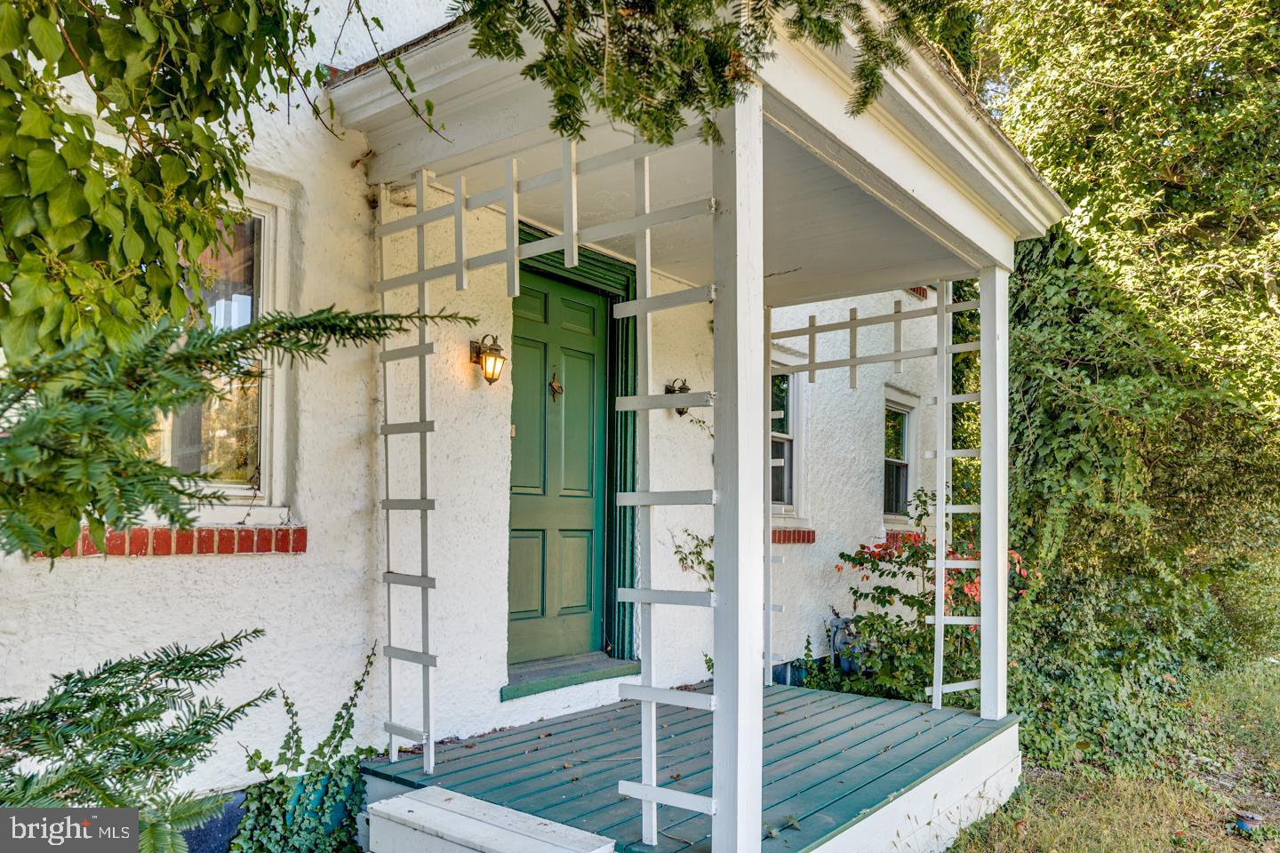 Incredible investment opportunity! This 1829 Farm-style home sits on 2.8 acres and combines timeless charm with some modern updates. Also, did we mention you can have HORSES on this property?!  The kitchen, primary bath, and half bath have been thoughtfully renovated, blending old-world style with today’s comfort. The property features a unique pet room and a barn with two stalls, electric, and plumbing (sold as-is). Public sewer is available. With its generous acreage, this property offers potential to subdivide, expand, or operate a home-based business—ideal for a studio, or professional office (with approvals). Conveniently located near shopping, dining, and major routes, including 295, 70, and 73. Endless potential for investors, entrepreneurs, or anyone seeking a property with character and opportunity!