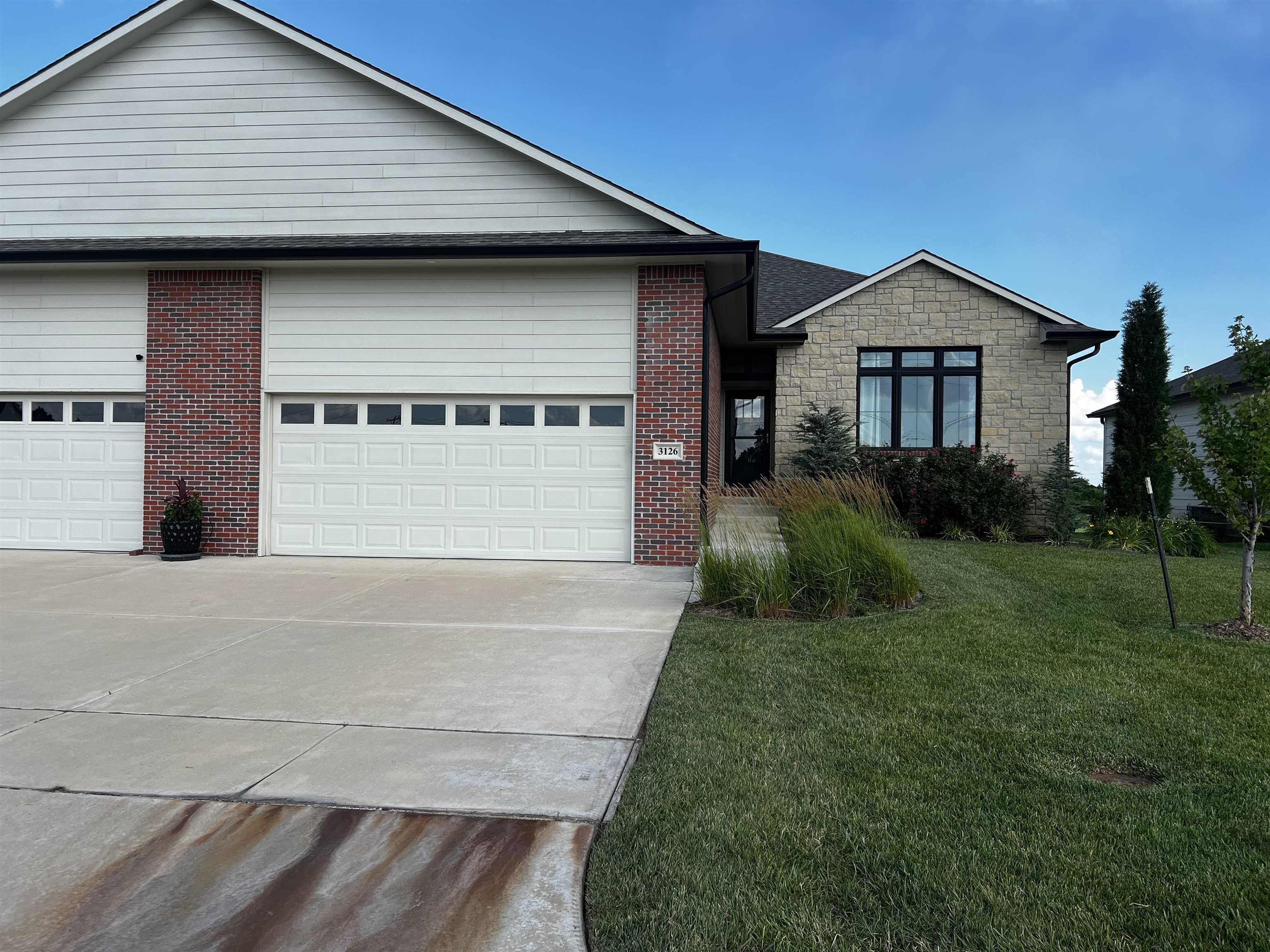Welcome Home !!! The Winfield Country Club is your back yard!!! it doesn't get any better than that!!!!This home has owners that have lived in this home very little! As you walk in the front door you are greeted with an atmosphere that is relaxing, open and comfortable . The large kitchen features granite countertops, an abundance of cabinets, an island to seat four and a walk in pantry! The kitchen opens into the living room and dining room, great for entertaining!! Enjoy the view of the golf course while at the dining room table or walk out on the deck to have morning coffee. The master suite features a grand bedroom, walk in closet , a huge bathroom with double sinks and walk in shower with a seat. Conveniently, the laundry is off the kitchen and garage.(no need to go to the basement to do laundry) Downstairs you will be wowed by the stunning stained cement floors, the abundance of natural light in the huge family room that boast a fireplace. Also on this level is a bedroom, bathroom, safe room with a steel door, equipment room and golf cart room with large doors that exit to the outside.(which is a covered patio and open air patio looking to the golf course). There is more!! Seeing is believing so give the listing agent a call today for your private showing!!!!