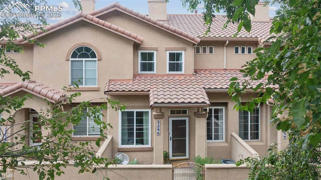 Welcome to 3246 Apogee View, a beautifully maintained townhouse offering the perfect blend of comfort, convenience, and style. Nestled at the rear of the community and facing peaceful open space, this home provides a quiet retreat while being just minutes from everything Colorado Springs has to offer.

Step inside to find a spacious and thoughtfully designed layout featuring two generous bedrooms, each with its own private bathroom and oversized walk-in closet. Whether you're hosting guests or looking for a roommate-friendly setup, the dual-suite design offers unmatched flexibility and privacy.

The kitchen boasts updated appliances and a clean, modern aesthetic that flows seamlessly into the main living space. A cozy front porch welcomes you home, while the attached two-car garage adds everyday convenience.

With tasteful updates throughout and a low-maintenance stucco exterior paired with a tile roof, this home is as practical as it is charming. Enjoy a short walk to the Broadmoor World Arena, a five-minute drive to Fort Carson, and quick access to downtown Colorado Springs in under ten minutes.

This is low-maintenance living in a prime location. Don't miss your chance to call it home.