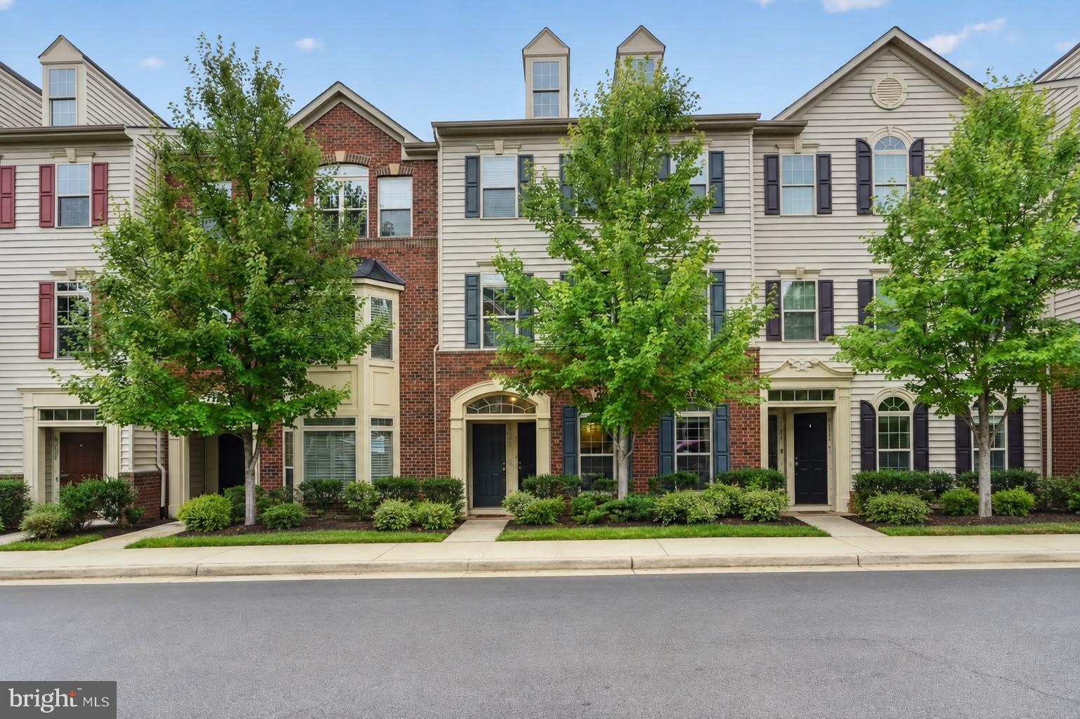 3 Bedrooms | 2 Full Bathrooms | 1 Half Bathroom | 1-Car Garage Beautiful townhome in the desirable Virginia Manor community featuring an open and functional floor plan. The home offers engineered hardwood flooring, stainless steel appliances, granite countertops, and a stylish backsplash. The convenient laundry room is located upstairs. The spacious primary bedroom features three closets, including one that is custom wall-to-wall,  for ample storage. The finished 1-car garage provides additional convenience and storage. It also includes a Level-2 EV charger. Enjoy excellent community amenities, including multiple swimming pools, a fitness center, and a clubhouse. Great location with comfortable living and resort-style community amenities. Buffalo Trail Elementary School, highly rated and ranked among the top 10% of all public elementary schools in Virginia, is located within walking distance.
