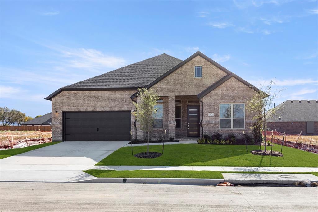 MLS# 21273988 - Built by Windsor Homes - Ready Now! ~ Discover this stunning single-family residence located in the desirable River Ranch subdivision, within the Van Alstyne ISD. This brand-new Bryan Plan boasts 4 spacious bedrooms, all designed as primary suites, and 3 full bathrooms across 2,718 sq ft. The inviting open floor plan features two living areas and a cozy gas fireplace, ideal for gatherings. The kitchen is a chef's dream, equipped with quartz counters, large island, double ovens, cabinet vent hood, and plenty of cabinets. Enjoy the outdoors on the covered patio, surrounded by a private yard. Additional highlights include decorative lighting, gas fireplace, 8 ft doors, wood flooring, walk-in closets, and central heating and cooling. With a 2-car garage and large covered front porch this home is perfect for modern living. Don't miss your chance to own this exceptional property!