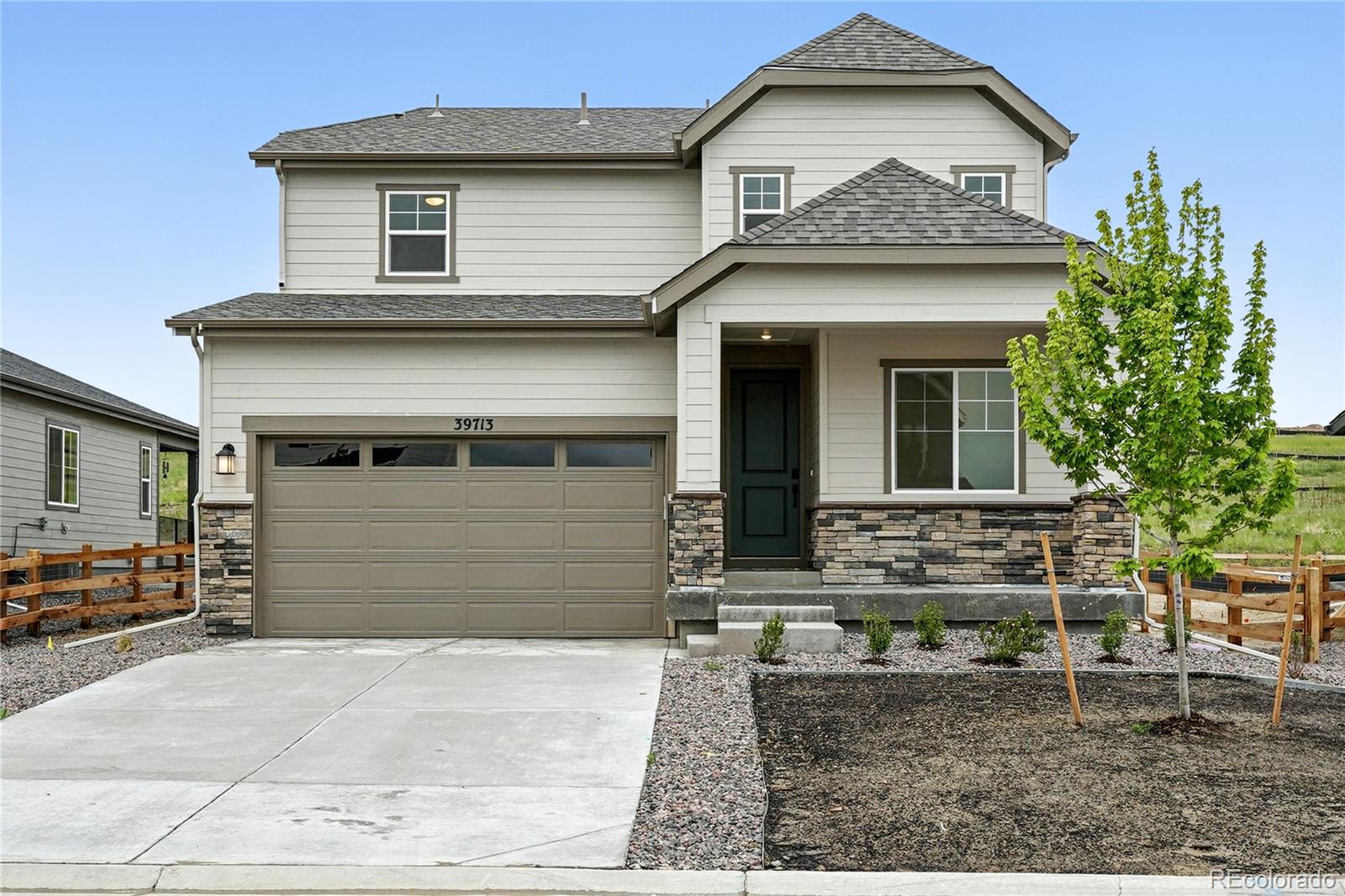 MLS#4167182 New Construction - Ready Now! Welcome to the versatile and inviting Estes! A bright foyer leads into the open great room, dining area, and kitchen—complete with a stylish island that’s perfect for casual hangouts or hosting friends. On the main floor, you’ll find a flexible space ideal for a home office, hobby zone, or extra lounge area, plus a convenient half bath. Head upstairs to unwind in the generous primary suite with its luxurious private bathroom. Three additional bedrooms offer plenty of space to stretch out. Need more room? The unfinished basement is full of potential. The Estes offers comfort, flexibility, and thoughtful design all in one. Structural options added include: covered concrete patio, additional upstairs bedroom, railing and rough in plumbing in basement.