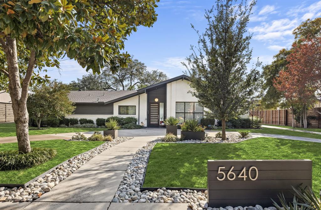 Located in the coveted Dallas neighborhood of Melshire Estates, 5640 Brookstown has been taken to the studs and fully renovated with a warm modern design and an exceptional flow from indoors to out. A beautiful mahogany front door welcomes guests to an open floor plan that features modern finishes and numerous windows that bathe the home in natural light. The first floor is grounded by a large living room with vaulted ceilings, a gas fireplace and expansive views of the backyard. The living room is open to a chef’s kitchen with a waterfall Quartz center island, rift-cut white oak cabinetry and top of the line Thermador and Viking appliances. A formal living room is situated at the front of home with decorative lighting and designer drapes with a more casual breakfast nook and built ins located off the kitchen. A spacious office allows from work-from-home flexibility and can be closed off for privacy. The primary suite is on the first floor and features an ash wood accent wall and a 12-foot sliding glass door with backyard access. The primary bath includes a modern soaking tub, frameless glass shower with dual shower heads, dual vanities, and two closets. Two additional guest bedrooms are located on the first floor with a modern Jack-n-Jill bathroom including dual sinks and designer tile selections. Upstairs you’ll find an oversized fourth bedroom with en-suite bath and walk-in closet, along with a game room equipped with a Quartz snack bar, microwave drawer, wine cooler, and a powder bath.An expansive backyard offers significant space with a beautiful pool, lush landscaping, mature trees, and a large grassy area for kids or pets. Centrally located in Dallas’ private school corridor with many of the city's best schools, easy access to all the shops and restaurants that Preston Hollow has to offer, as well as major travel arteries for a quick commute anywhere in DFW.