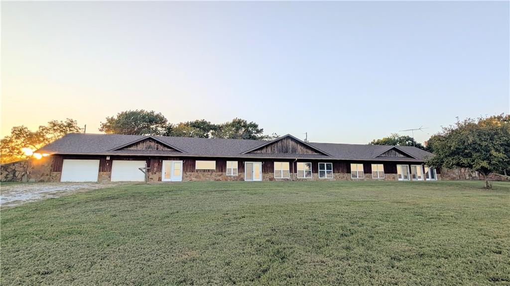 A Million-Dollar View and Endless Possibilities Await!

Tucked away at the end of a quiet country road, this incredible 80-acre property just east of El Dorado Springs offers the privacy, beauty, and space you’ve been dreaming of. Perched on a hilltop overlooking miles of scenic countryside, the views alone are worth the trip — but there’s so much more to love. The land is a perfect blend of pasture (approximately 25%) and timber, complete with partial fencing, a pond, and a wet-weather creek, making it ideal for both livestock and outdoor recreation.

The spacious earth-contact home offers nearly 4,000 square feet of living space, featuring 4 bedrooms, 3 baths, and a 32x28 two-car attached garage. Inside, you’ll find room to spread out, entertain, and enjoy country living at its finest.

Outside, a 38x60 shop with partial concrete flooring and electric provides plenty of workspace or storage, while the charming 1925 barn (30x36 with loft) adds a touch of historic character.Properties like this — with space, privacy, and breathtaking views — don’t come along often. You’ve found your dream escape right here!