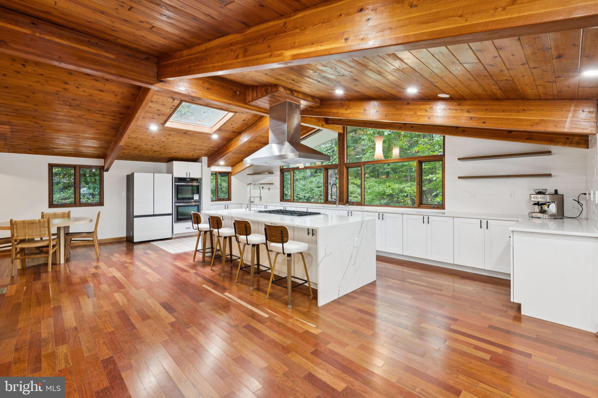 Nestled in a serene and established enclave, this expansive 5-bed, 4.5-bath home ( 6,800 sf) sits on a generous 0.33-acre lot. Just blocks from the vibrant Reston Town Center and a short walk to the Silver Line Metro, you’ll relish the seamless blend of urban convenience and tranquil community living.If recreation is on your agenda, you’re covered: the prestigious Reston National Golf Course is just minutes away, offering a lush, private backdrop. Meanwhile, the neighborhood extends lake access and a private beach, giving you the perfect setting for summer fun, paddleboarding, or restful evenings by the water.With tree-lined paths, green buffers, and a layout that prioritizes both privacy and access, this property captures the essence of Reston’s vision for integrated, amenity-rich living. Don’t miss your chance to own a distinctive home where location meets lifestyle.