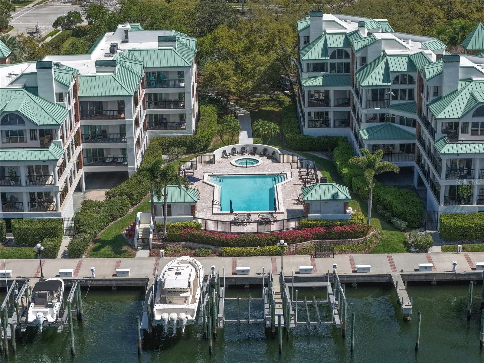 One or more photo(s) has been virtually staged. Rare opportunity to own a beautiful penthouse two-story corner residence with three bedrooms and three baths in the much sought-after waterfront community of Seddon Cove on Harbour Island, offering fantastic water views from almost every room.  This light-filled top-floor home features high ceilings, an open floor plan, and abundant natural light, offering space, privacy, and water views rarely found in condominium living.The main level includes an exceptionally large family room with a wood-burning fireplace, formal dining area, en-suite primary bedroom, and a third bedroom ideal for a guests with a full bath.  The updated kitchen with Cambria quartz countertops, a breakfast nook, and newer stainless steel appliances flows into the main living areas and opens to a large wraparound balcony overlooking Seddon Channel.  Step out and enjoy morning coffee, sunset views, outdoor dining or grilling. Upstairs, a spacious loft—ideal for an office, den, or bonus area—offers water and sunset views and accompanies a second primary en-suite, with each sharing a private balcony.  Bedrooms feature large walk-in closets, and bathrooms include dual vanities and soaking tubs with showers.  The residence offers two oversized interior storage rooms, plus two reserved covered garage parking spaces and a private exterior storage closet.Recent improvements include new roof (2026), new building elevator (2025), Pella WindGuard Impact windows and doors (2019-1st level except guest room), Impact Resistant Vinyl windows/doors 2nd level (2013), HVAC (2015), electrical updates (2019), fresh interior paint (2026), updated kitchen with Hunter-Douglas shades and plantation shutters, additional electrical updates throughout (2025), new dryer vent (2025), recently painted interior, and much more.  Seddon Cove offers 24-hour manned security, gated entry, resort-style pool and spa, courtyard fountain, marina access with fishing, and lush landscaped walking paths with garden ponds.  Walkable community...located across street from Life Time Fitness, and minutes to Water Street Tampa, Sparkman Wharf, Amalie Arena, Tampa Riverwalk, Florida Aquarium, Straz Center for the Performing Arts, Bayshore Boulevard, with easy access to Interstate 275, the Lee Roy Selmon Expressway, and Tampa International Airport.**Optional and Separate** opportunity to purchase boat slip with 30K lbs. (15 ton) lift (approx. 14’ x 50’) located within the gated South Neighborhood Association (buyer to verify specifications).  Ownership restricted to residents living behind gates of SNA.  A unique opportunity for the buyer to add a boat slip!  See MLS TB8485208.