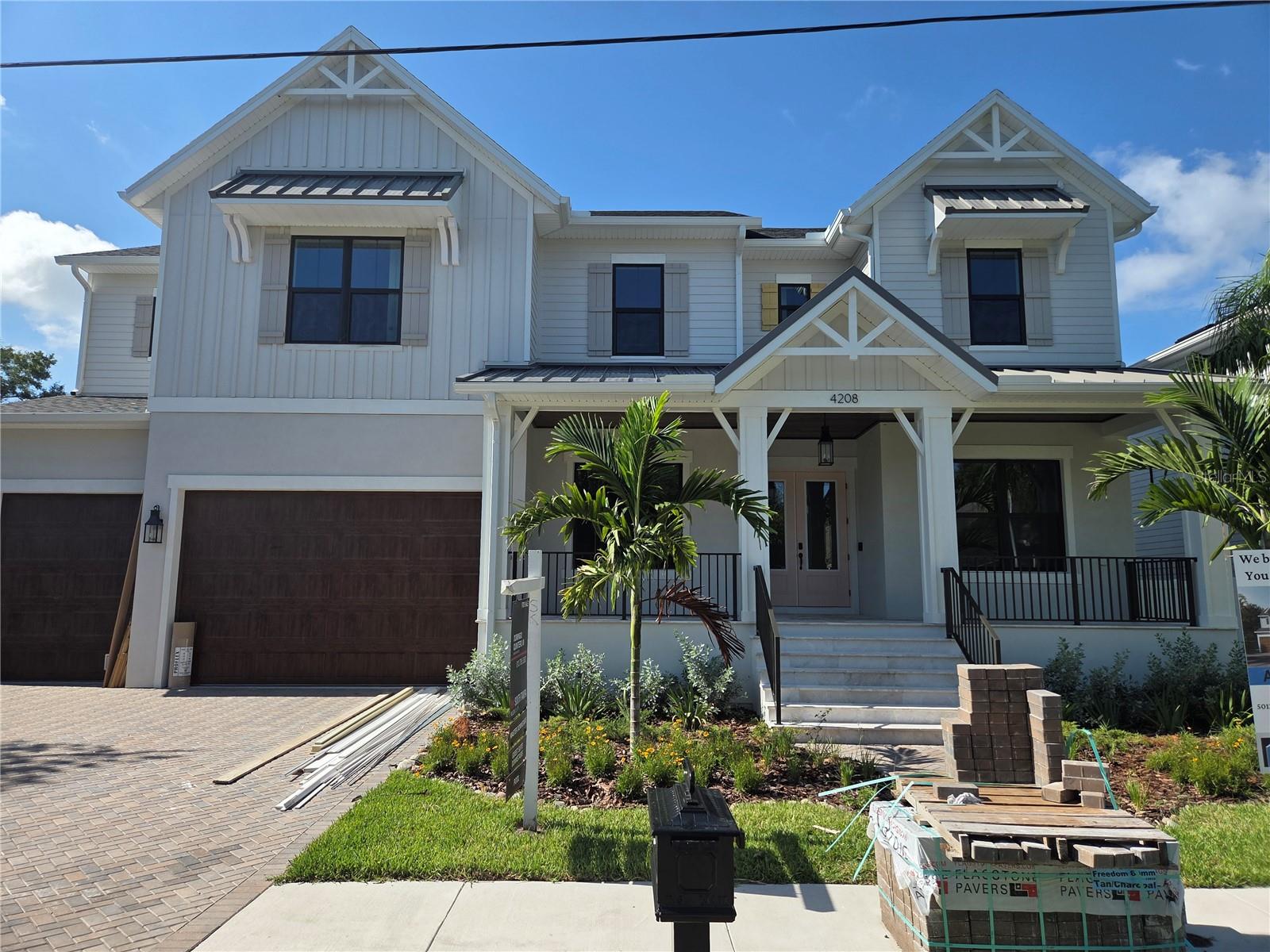Under Construction. Under Construction.  This stunning New Legacy Home features the best of what any builder has to offer!  Located in the heart of South Tampa in the Maryland Maor neighborhood of the Plant HS district, this home has it all!  Five full bedrooms including a downstairs guest suite, two offices (one upstairs and one downstairs,  a bonus/recreation room, a media room. And a 3 car garage!  This Energy Star beauty offers a perfect blend of luxury and energy efficiency.  Past the double door entry is a study the right and formal dining room with tray ceiling and wine display on your left. The foyer then opens up to an expansive family room with soaring  20+ ceilings gas fireplace, and open stairwell to the second floor.  The kitchen boasts upper stacked cabinets to the ceiling and an oversized pantry that can be used for food prep.   With high end Thermador appliances  and  large island that can easily seat four, this gourmet kitchen has everything for the most acquired chef!  The primary suite is located on the ground floor with an enormous walk-in closet, free standing soaker tub, large shower,  and split vanities with plenty of drawer space.   The ground floor also has a separate guest suite with a full bath that doubles as the pool bath.  The first of two laundry rooms is also on this level.  Moving to the second floor, there is a large recreation/game room with a kitchenette that is perfect for entertaining and includes a beverage cooler, microwave drawer, and dishwasher.  Behind the game room is a dedicated media room to watch all your favorite sports and movies.  Three separate guest bedrooms – all with walk-in closets, and full bathrooms are also on this level.  Finally, a second laundry room and second home office are also on this level.  French doors lead from the family room to an expansive covered lanai with outdoor kitchen and plenty of room for multiple patio sets.  Steps going down lead to the luxurious saltwater and pebble tech heated spa & pool below with plenty of back yard left over.   Other features includes: elevator shaft and pre-wire for future use; Icynene spray foam insulation; impact windows and doors; and so much more!  See the full list of upgrades, floor plans, and sample finishes in the images.   Minutes from shopping, Hyde Park, Bayshore, MacDill AFB, Tampa International Airport, downtown Tampa and the bridges leading to St. Petersburg/Clearwater.   Don’t miss out on the opportunity to own this brand new South Tampa gem!
