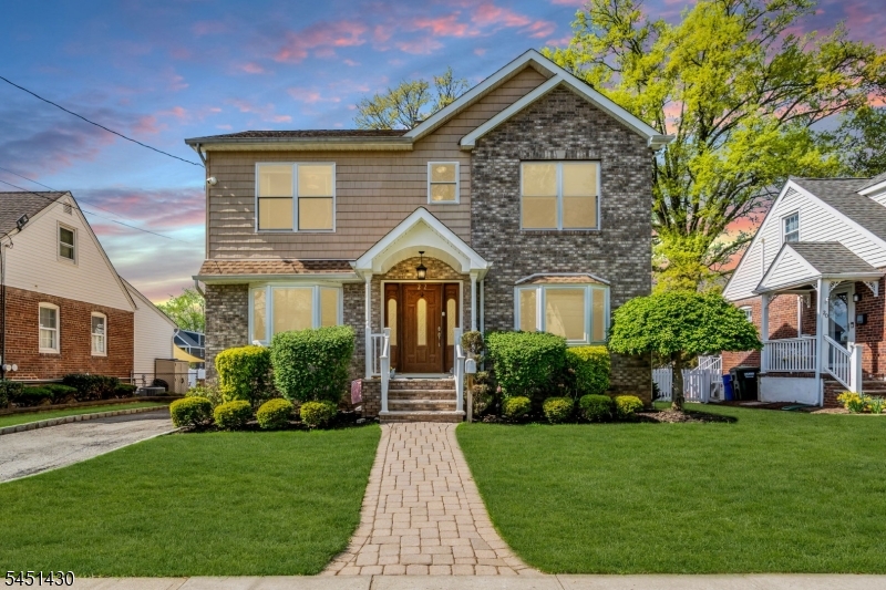Welcome to 22 MacArthur Street in the heart of Cranford, where timeless Colonial charm meets modern comfort. This beautifully maintained 3-bedroom, 3-full-bath home offers spacious living with thoughtful updates throughout. Step inside to discover an oversized living room filled with natural light, a formal dining room perfect for gatherings, and a generously sized eat-in kitchen featuring abundant cabinetry, ample counter space, and a bright breakfast area with skylights. Sliding doors lead to a large deck overlooking the fully fenced backyard, creating the perfect setting for entertaining, summer barbecues, or relaxing outdoors. Upstairs, you'll find three spacious bedrooms, including a private primary suite with vaulted ceilings, a walk-in closet, and a beautifully appointed en-suite bath. A finished basement expands the home's living space with a large flex space, laundry room, and plenty of room for storage. Situated on a quiet, tree-lined street in one of Cranford's most desirable neighborhoods, this home offers the perfect blend of comfort, functionality, and location. Conveniently close to parks, top-rated schools, downtown Cranford, shopping, dining, and NJ Transit for an easy commute to New York City, this is an exceptional opportunity to enjoy everything Cranford has to offer! Plus No Flood Zone!