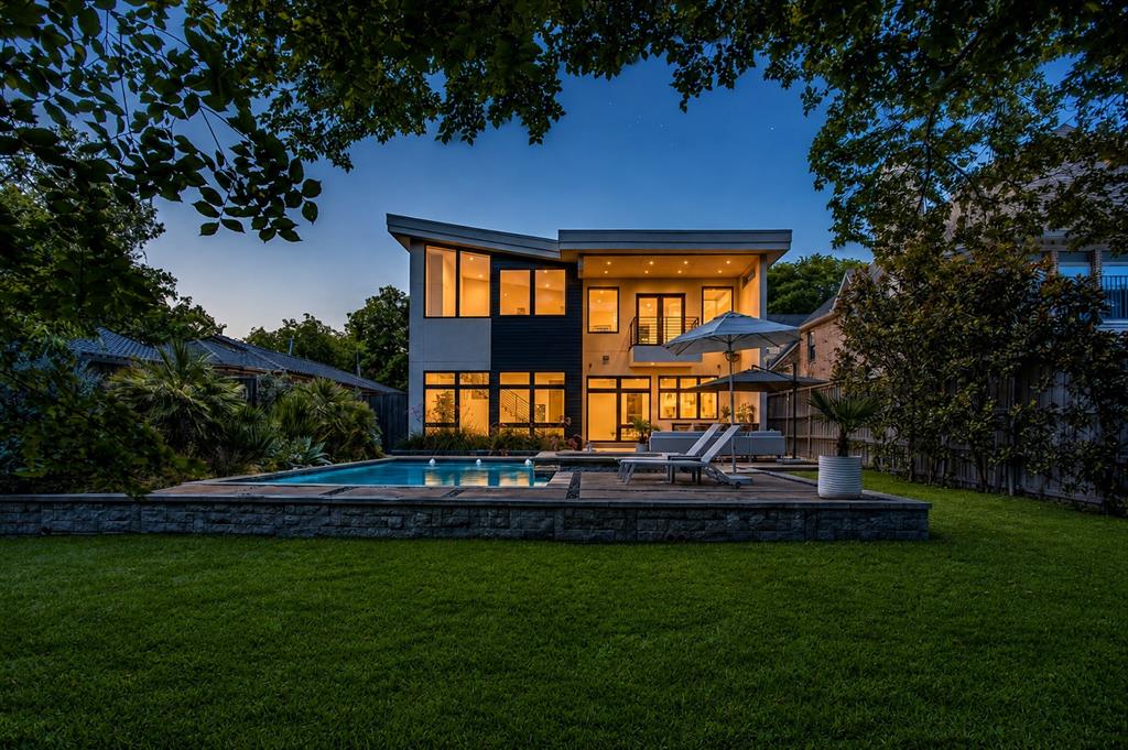2215 Madera Street - Modern Luxury Meets Ultimate Walkability in the Henderson Corridor. Custom-built and masterfully designed by ParmaDesign, this modern gem is nestled in the coveted Henderson corridor, blending sleek aesthetics with unmatched quality. From the moment you step inside, you'll be captivated by the museum-smooth walls, soaring ceilings, and walls of Andersen windows that bathe every corner in natural light.The thoughtful layout welcomes you with a spacious entry, wide gallery-style hallways, and an open-concept living space that flows seamlessly throughout. The kitchen is a chef’s dream, boasting a Wolf and Sub-Zero appliance package, custom cabinetry, a large center island, and expansive quartz counters, perfect for everything from gourmet meals to casual gatherings. The split-bedroom layout provides ideal privacy, with the primary suite featuring a private balcony overlooking the city skyline and lush rear grounds. All bathrooms are adorned with sleek, modern fixtures and luxurious finishes.Step outside into your personal sanctuary - a rare retreat complete with a sparkling pool, relaxing spa, cozy fire pit, outdoor kitchen for al fresco dining, and a lush, expansive grassy area. Designed for both high-end entertaining and quiet relaxation, this backyard oasis is thoughtfully shielded to maintain complete privacy while backing directly up to the neighborhood's newest asset.Situated directly behind the brand-new, walkable Henderson Ave retail, office and dining village, this home offers an unrivaled lifestyle perk: effortless, back-door access to Dallas’s newest destination for boutique shopping, chef-driven dining, and artisan cafes without ever needing a car. Enjoy the rare combination of a private, resort-style backyard with world-class amenities right at your doorstep. If you’ve been searching for a spacious, modern architectural landmark in the heart of one of the city’s hottest neighborhoods, 2215 Madera Street is the ultimate find.