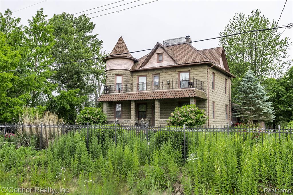 Discover the charm of this spacious historic Victorian home, offering over 3,800 sq. ft. of living space filled with beautiful natural woodwork and timeless character. The property features 5 bedrooms and 2 full baths, along with a basement. Comfort is ensured with hot water heat, central air conditioning, and natural gas service.

Set on 6.3 picturesque acres, the land includes a peaceful pond and multiple outbuildings to suit a variety of needs. A massive 64x48 pole barn with a loft provides exceptional storage or workshop space, while a 45x36 granary with lean-tos offers even more versatility. Relax and unwind in your own private sauna, perfectly blending modern comforts with the property’s historic charm.

This unique Victorian estate combines historic character with practical amenities and abundant land—ideal for those seeking space, storage, and serene country living.