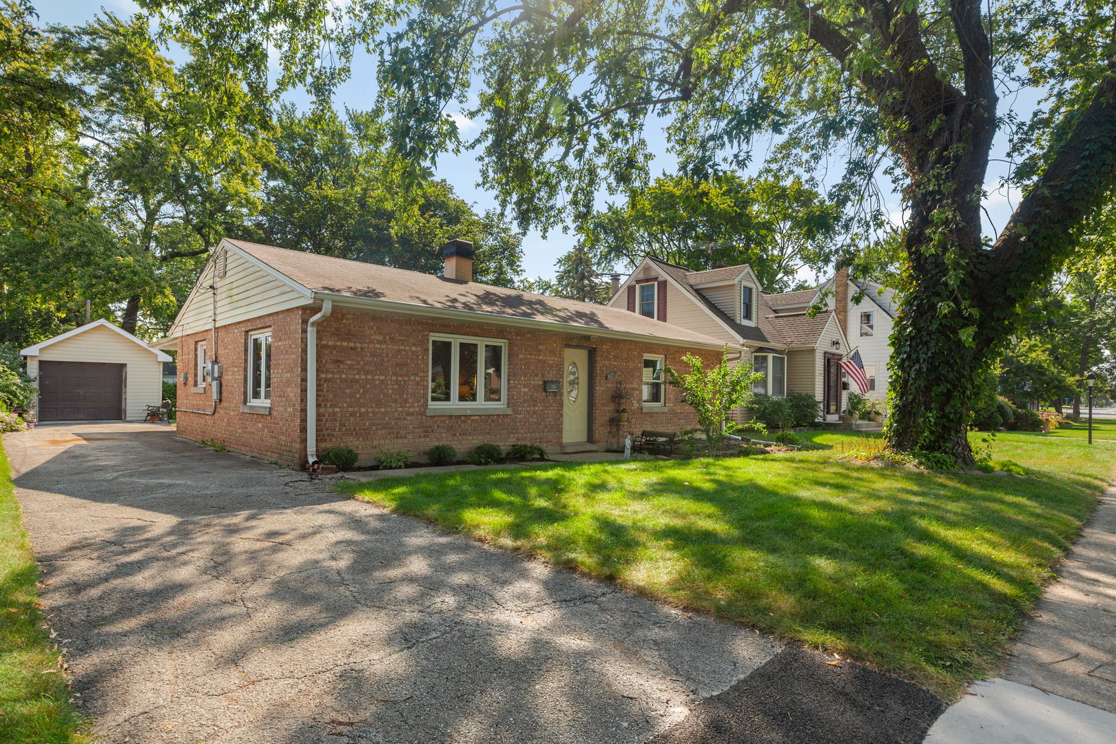 Unbeatable location! Just steps from downtown Arlington Heights, in the exclusive HANA District, this sweet 2BR/1BA true ranch is ready for you to come home. Open to a  bright living/dining combo with Pergo floors, neutral decor, casement windows, and ceiling fan at DR. North and west exposures bathe the rooms in sunlight. Kitchen has maple cabinets, clean counter space, white appliance suite, SS refrigerator, multiple workstations. Both bedrooms are queen-size and boast huge closets and neutral decor. Full bath has been updated with easy-entry shower + bench, tile surround, modern fixtures. Huge family room has N/S/E exposures, easy-clean tile floors, and overlooks rear gardens with perennial floral beds. Because this is a true ranch, there is no basement, so everything is on one level! W/D + utility sink off kitchen. Separate mechanical room + storage with built in shelving GFA. 100AMP service, circuit breakers. 1C garage + 3C driveway. Multiple Rain barrels included. The entire home has been freshly painted, trimmed, deep-cleaned, completely move-in ready! An incredible value for first-time or downsize buyers, or as an investment purchase with amazing equity potential. Don't let this one pass you by.