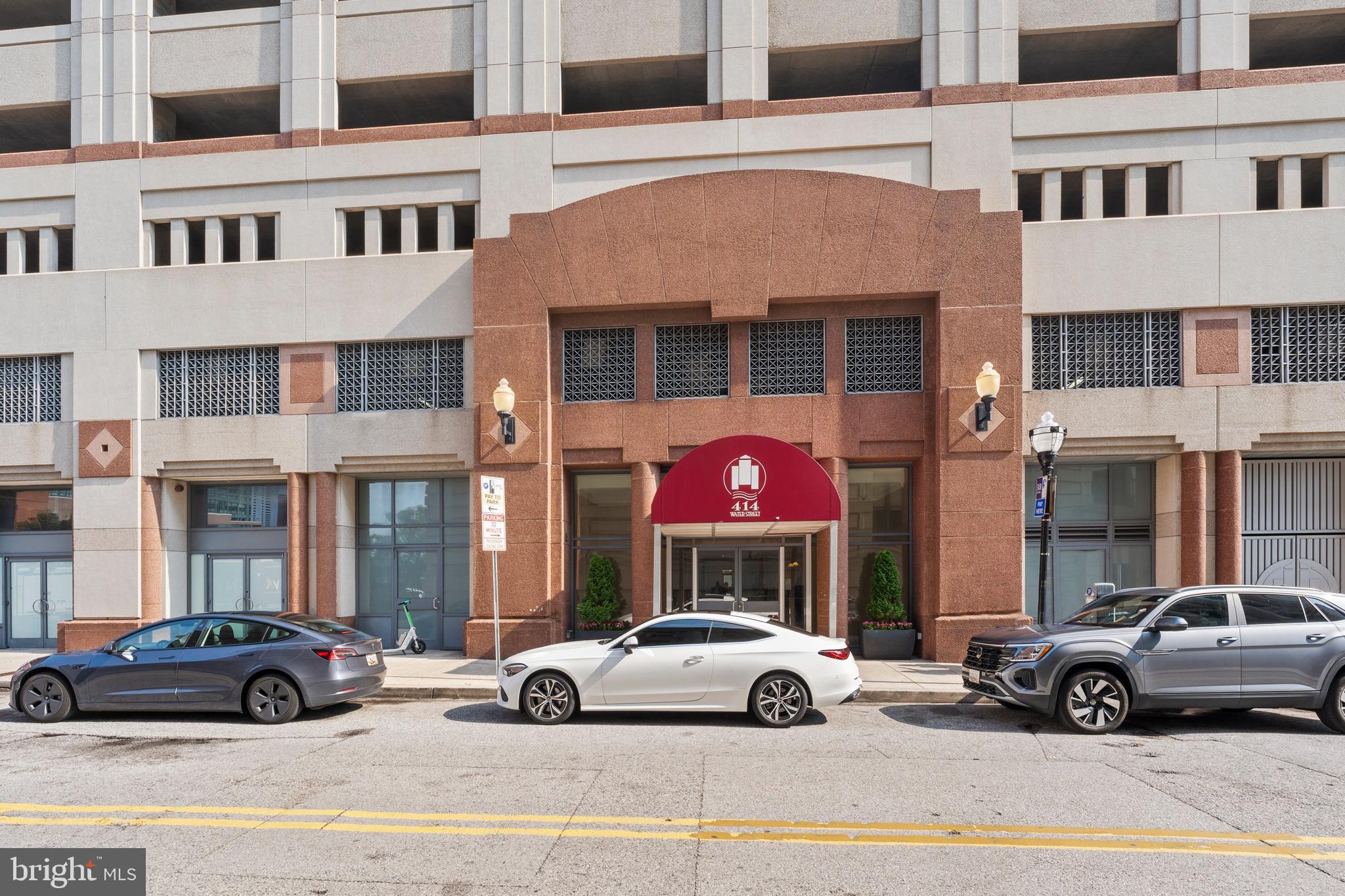 PRICE IMPROVEMENT !!! ****MOTIVATED SELLER*****  Welcome to 414 Water Street – where luxury meets convenience. As you enter, you're immediately welcomed by a concierge service and a stunning lobby. Hop on the elevator and head to the 11th floor to discover unit 1112, your new home.Step into the foyer, where you'll find a handy coat closet, utility closet, and plenty of space to kick off your shoes. The gleaming hardwood floors shine throughout, complemented by an abundance of natural light pouring through the windows. The open-concept living and dining area is perfect for entertaining or relaxing, while the updated kitchen with newer appliances offers everything you need to whip up your favorite meals.The spacious primary bedroom features two closets and a private en-suite bath with a separate shower and soaking tub for the ultimate retreat. The second bedroom is equally impressive with generous space and plenty of natural light. The hall bathroom is equipped with a tub/shower combo for added convenience. And for ultimate comfort, this home offers in-unit laundry!Step outside and enjoy the best of both worlds. The kitchen features a balcony, ideal for your electric grill or for letting your furry friends breathe in some fresh air. The expansive living room balcony is your front-row seat to breathtaking sunrises with your morning coffee or evening sunsets with a glass of wine – all while soaking in the stunning city skyline and water views. Whatever your mood, this condo is the perfect backdrop.Building Amenities:Mezzanine-level outdoor pool and hot tub (perfect for relaxing without the height)Fully equipped fitness center with city views while you work outA community room that’s perfect for socializing or reserving for private events1-leased garage parking spotLocation, Location, Location!Just steps from the Baltimore Inner Harbor, Harbor East, and a vibrant selection of shops, restaurants, and businessesConveniently close to major hospitals and universitiesEasy access to I-83, I-95, and I-295, making commuting a breezeParking: Please use off-street or metered parking for all showings.Don’t miss out on the chance to call this beautiful condo your home! Schedule a tour today.