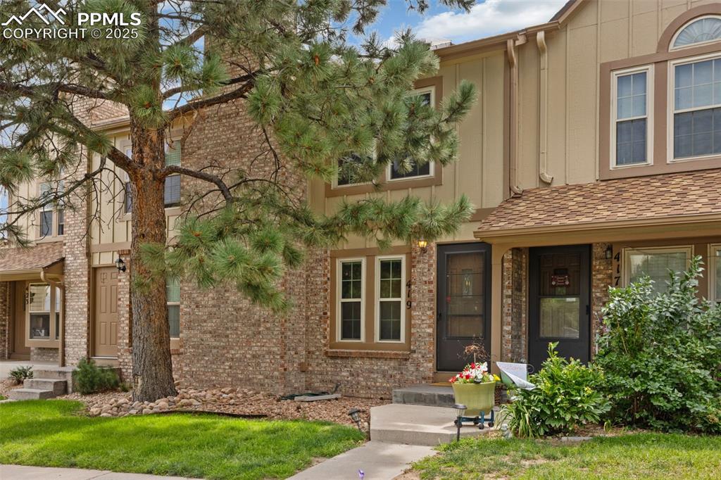 This Beautiful & Affordable 2 Bedroom Condo located w/in the desirable Rockrimmon area is a Must See!! The Seller has done all of the work for the new buyers in this unit // Newly Remolded Kitchen w/ Gorgeous Quartz Countertops, Stainless Steel Appliances, Gas Stove, Slow Close Cabinets & Drawers, Pantry w/ Rollout Drawers, Overhead Can Lights & Recessed Counter Top Lighting makes this Townhome Extremely Desirable // The Main Level boasts an open & relaxing Living Room with a wood-burning Fireplace & Dining Room Combo that flows into an inviting kitchen w/ an amazing kitchen island breakfast bar that's perfect for entertaining & relaxing w/ family & friends // Newer Luxury Vinyl Plank Flooring throughout the Main Level & High-End Double Pane Vinyl Windows w/ custom cellular blinds // Just off of the kitchen, walk out & enjoy the private and newly remodeled 12 x 6 Trex Deck to enjoy the peaceful surroundings & perfect for grilling & entertaining friends // You can also enjoy the Front Range mountain views from your front porch // The spacious upper level offers 2 large bedrooms w/ ample closet space in both bedrooms  // This wonderful townhome has also been updated w/ new paint & carpeting on the main level, bedroom level, & basement steps / The Unfinished Bsmt offers unlimited possibilities for the buyer's design ideas // Close to Hwy. 25, Air Force Academy, Hiking & Biking Trails, Restaurants, Shopping, Hospital, Fire & Police Dept, Golden Hills Park, Ute Valley Park, Blodgett Peak & Open Space, Award Winning School Dist. 20, UCCS, Pulpit Rock Park, & soooo much more!! 
Schedule Your Showing Today!!