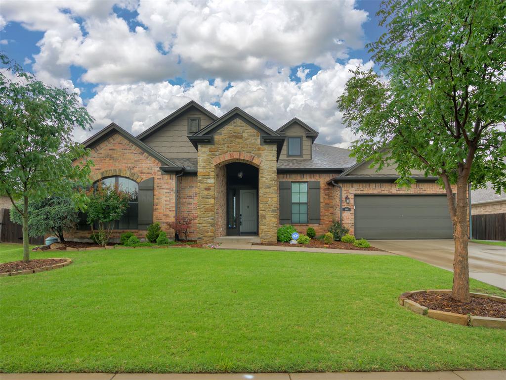 You found it! This 3 car garage is tandem and the elegant 4 bed, 4 bath home situated on a cul-de-sac has style and curb appeal for days! The brick and stone exterior is timeless and is outfitted with full guttering and landscaping. Step inside to be captivated by a showplace where all bedrooms are downstairs, features updated lighting, refreshed interior paint, stunning hardwood floors, soaring ceilings and natural light. The entry is spacious and guides you toward the study opposite the stairs leading to the bonus room on the second level. The bonus room allows you to enjoy your favorite movies or sport events complete with a projector, a screen and surround sound. The open living, dining and kitchen space along with kitchen eating area with built-in coffee/buffet space allow for great gathering spaces. Built-ins are also carried through into the living area creating a warm and cozy environment as well as storage. The kitchen is super inviting with a decorative splash of color and windows to the back yard. Lower kitchen and dining cabinets are equipped with pullouts for extra convenience. The newer 5-burner gas stove and ample countertop space provides ease of meal prep. The primary suite offers a sense of seclusion with an ensuite with double vanities, walk-in closet and a tiled shower. Roomy secondary bedrooms are also included in this classy home. Enjoy extra living space outside with extended patio and a beautiful custom pergola with ceiling fans. The 3-car tandem garage makes for a lot of extra storage space. The Carrington community includes ponds, 2 pools, walking trails and the Carrington Lakes Clubhouse. Ruby Grant Park and Splash Park is across 36th from the entrance. Norman Regional Healthplex is 1.5 miles away. Easy access to I-35 North or South!