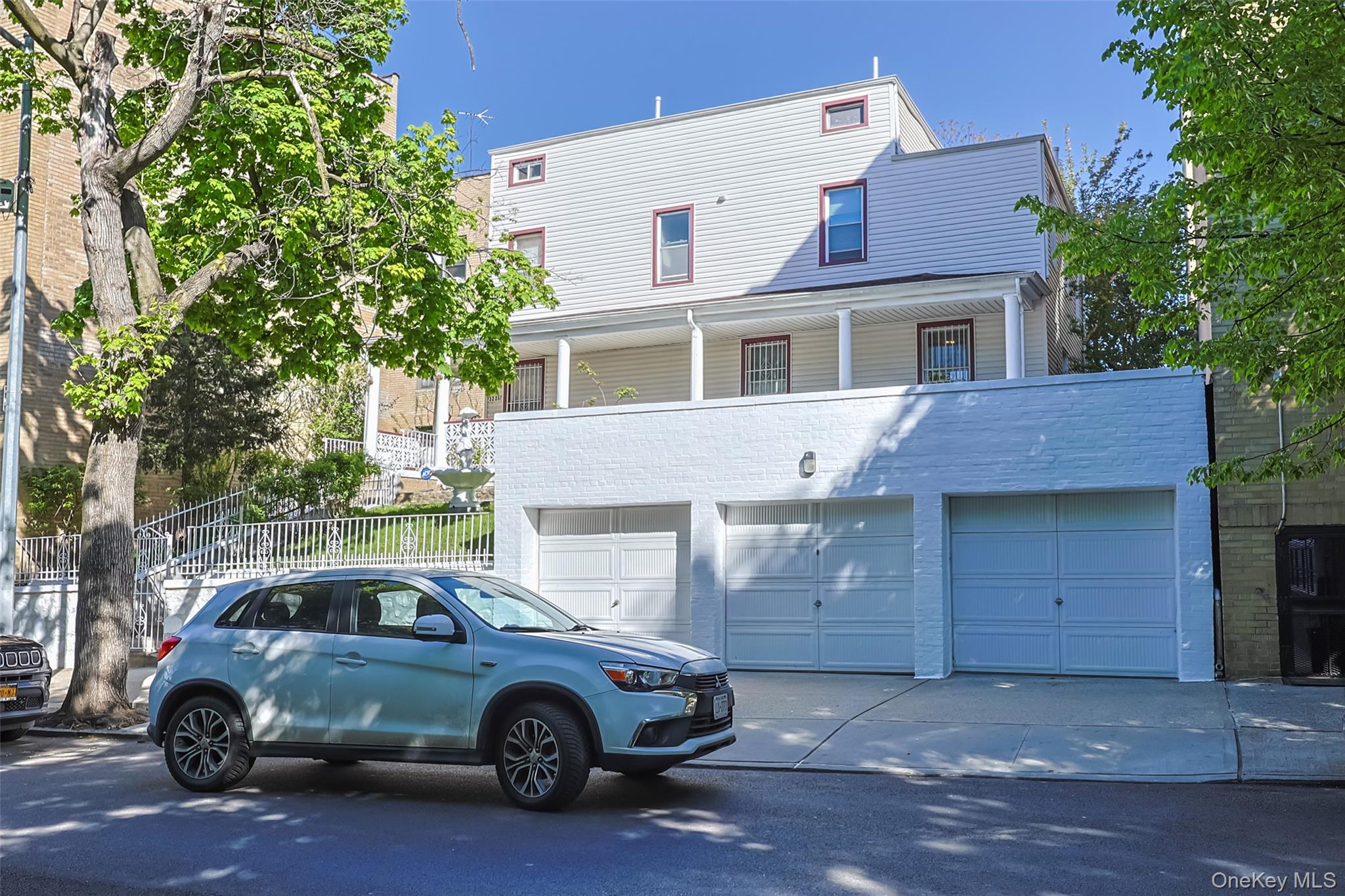 Welcome to 32-25 30th Street — a rare oversized property in the heart of Astoria offering exceptional scale, character, and development potential.Situated on a generous 60x90 lot, this expansive residence is currently configured as an SRO, featuring 10 rooms and 2 bathrooms on the second floor, along with 3 rooms, a formal dining room, living room, and kitchen on the first floor. The layout offers incredible flexibility for investors, end-users, or those seeking a multi-generational setup.Throughout the home, you’ll find beautifully maintained wood finishes that bring warmth and a timeless, estate-like feel. While the interiors carry a classic charm, they present a prime opportunity for modernization and customization to maximize value.The first floor includes a full bathroom with both a shower and tub, adding convenience and functionality. Additional highlights include a large attic, full basement, and multiple outdoor spaces, including two patios perfect for relaxation or entertaining.This property truly stands out with three attached garages, offering rare and valuable parking capacity in Astoria.Enjoy stunning views of the NYC skyline, all while being centrally located just moments from public transportation, including subway and bus lines, as well as shops, restaurants, parks, and major highways.Investors take note: Located in an R5 zoning district (FAR 1.25, max lot coverage 55%), this lot presents significant upside potential for redevelopment into a larger residential building, including attached homes or small apartment structures.A unique opportunity to own a massive property with character, parking, and future upside in one of Queens’ most desirable neighborhoods.
