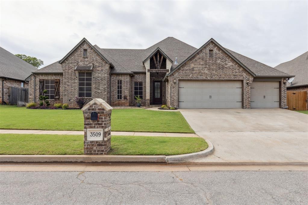 Welcome to this stunning 5 bed, 3 bath home in the Morgan Creek neighborhood with a Large Flex room that could be use as a dedicated game room/theater room/home gym or a 6th bedroom! The open concept kitchen is a standout feature, with granite countertops that flow throughout the home. You’ll find a gas stove, an island, and stainless steel appliances, all perfect for cooking and gathering. The living room, framed by a cozy brick fireplace, invites you to relax and unwind. This home includes TWO master suites. The bright and airy primary suite is seperate from the other bedrooms and offers an en suite bathroom with a spacious walk-in shower, a freestanding soaking tub, dual vanities, and a walk-in closet. Oh and did I mention all the carpet has been replaced?! The laundry room provides plenty of storage and a utility sink for added convenience. The garage features a handy VersaLift for easy storage, and an in-ground sprinkler system helps keep your lawn lush. Outside, you’ll discover a spacious backyard with a covered patio that backs up to a greenbelt.  As part of the Morgan Creek community, you’ll have access to amenities like a pavilion next to a stocked pond, a soccer field, and a baseball diamond. Great location in the Mustang School District. Come see for yourself—you might just find your perfect place here!