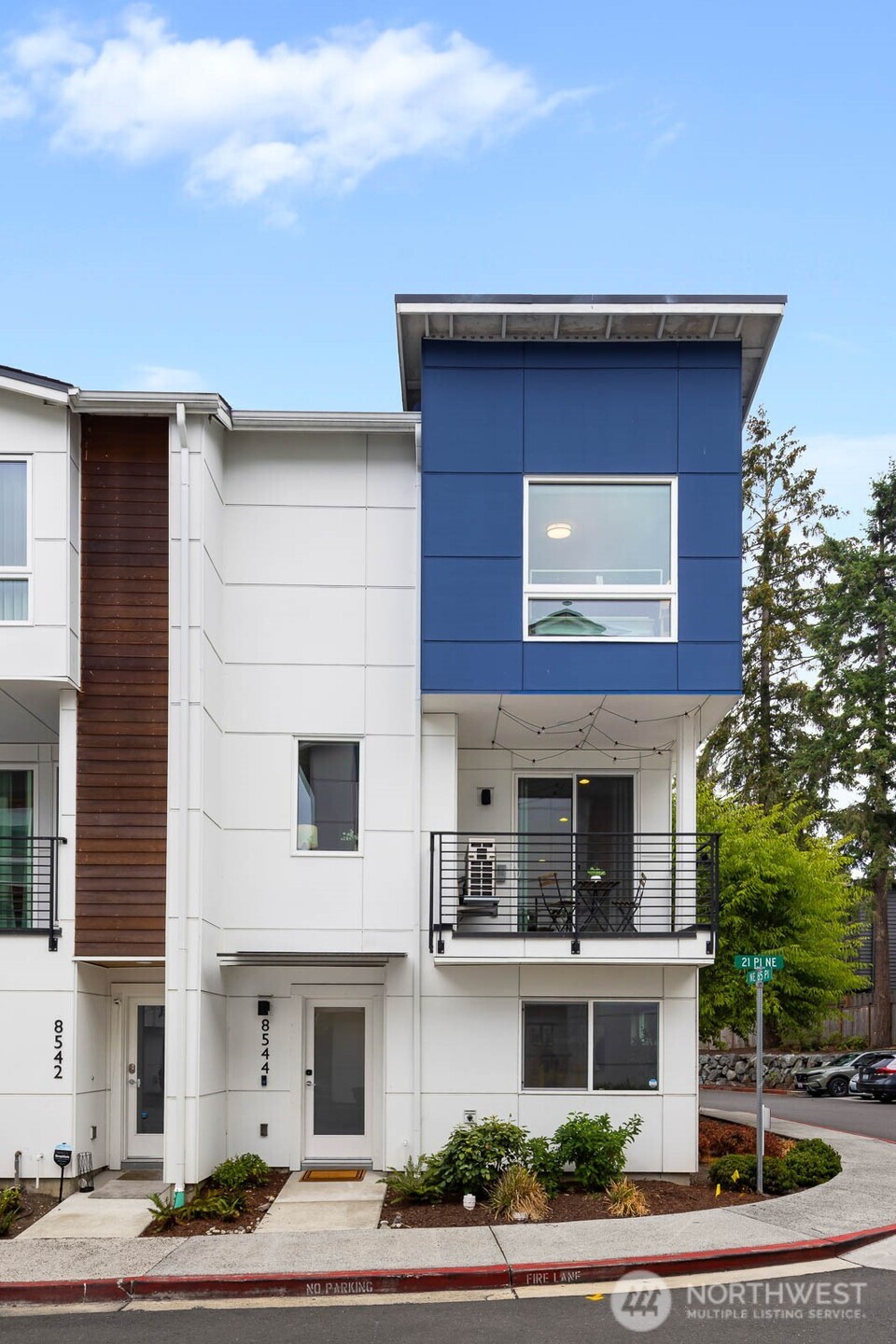 Welcome to Ravenna 88, where contemporary design meets effortless Seattle living. This light-filled, west-facing 4-bedroom, 3.5-bath home offers a thoughtfully designed floor plan with plenty of natural light, stylish finishes, and modern comforts throughout. The kitchen shines with painted wood cabinetry, quartz countertops, glass tile backsplash, stainless steel appliances, and a generous island with bar seating—perfect for casual meals or entertaining. Step outside onto the private deck and enjoy your morning coffee or unwind at the end of the day. A 2-car side-by-side attached garage provides convenient parking plus room for storage, while AC keeps the home comfortable year-round. Ravenna 88 residents enjoy beautifully landscaped courtyards and a community park, creating a welcoming neighborhood feel. Ideally located near University Village, Green Lake, major commuter routes, and public transportation, with easy access to all that downtown Seattle has to offer. Modern style, abundant light, exceptional convenience—this is Seattle living at its best.