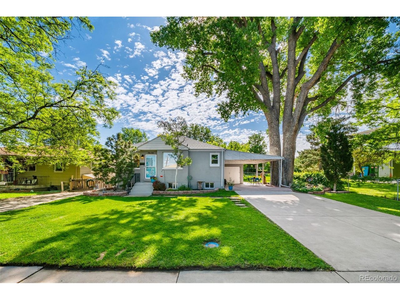 Welcome to this charming Englewood bungalow, where mature trees and a spacious lot create a peaceful setting. Thoughtfully updated throughout, the home welcomes you with abundant natural light, an open layout, and evident pride of ownership. Large premium Apex triple-pane windows fill the living and dining spaces with natural light, while updated flooring and modern finishes extend throughout the home. The beautifully updated kitchen features quartz countertops, new tile flooring and backsplash, and stainless-steel appliances. Home chefs will appreciate the WiFi-enabled GE range with built-in air fryer and temperature probe functionality. The open-concept layout creates an effortless flow between the living, dining, and kitchen spaces. The main level offers two bedrooms, an updated full bathroom, and energy-efficient LED lighting throughout. Downstairs, the finished basement expands the living space with two additional bedrooms, a large family room/flex space, a dedicated laundry room, and a fully renovated 3/4 bathroom. The second bathroom features a new shower, sink, toilet, and a bath fan with Bluetooth speaker, LED lighting, and night-light functionality. Outside, you'll find a private backyard framed by mature trees and lush landscaping. An attached 1-car garage, attached carport, and storage shed equipped with electricity provide convenient parking and storage options. This home has been meticulously maintained with numerous recent improvements, including newer roofs (2025), a Bradford White water heater with expansion tank (2025), a newly reglazed bathtub (2025), new switches and outlets throughout (2026), new front and rear hose bibs (2024), smart smoke and carbon monoxide detectors, water leak alarms near the washing machine and water heater, and exterior paint on the house and shed (2021). With a Walk Score of 85, you'll enjoy easy access to local restaurants, shopping, parks, schools, and everyday conveniences. Schedule your showing today!