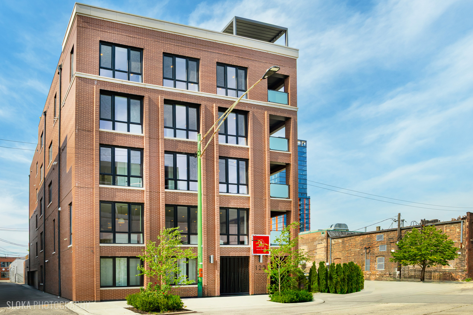 BEST VALUE PENTHOUSE WITH PRIVATE ROOFTOP IN THE WEST LOOP! LAST 2 UNITS REMAIN IN THIS DEVELOPMENT. Tucked away on a quiet side street in the heart of Chicago's vibrant West Loop, this stunning new-construction duplex penthouse offers an unparalleled blend of luxury, space, and privacy. Spanning two expansive levels with over 1700 sq ft of private rooftop deck, this 5-bedroom + den/office, 4-bathroom residence includes direct elevator access and an attached heated 2-car garage-a rare find in the city. Developed by the highly regarded PLD Homes, every inch of this home exudes quality craftsmanship and sophisticated design. The 35-foot-wide interior is flooded with natural light, showcasing a wide-open floor plan ideal for both everyday living and elevated entertaining. Main Living Level: Open-concept layout with floor-to-ceiling east-facing windows Expansive living room, separate dining area, and custom wet bar Designer chef's kitchen with panel-ready Thermador appliances, quartz countertops, and custom cabinetry Fifth bedroom or a family room + office/den a full bathroom and covered private terrace - all on the main floor. Second Level: Luxurious primary suite with walk-in closet, private terrace, and spa-caliber bathroom featuring a soaker tub, steam shower, and heated floors. Three additional bedrooms with custom closets and two full bathrooms. Enter this level directly through a private mudroom. Spacious laundry room and separate storage area. Rooftop Oasis: A private interior stairway leads to the top-floor flex space, ideal for a second office or lounge with wet bar-opening to your exclusive rooftop retreat. Enjoy panoramic 360 skyline views, unforgettable sunsets, and endless entertaining potential. Hot tub and shower will be installed on the roof. This boutique building offers the privacy and feel of a single-family home with the luxury conveniences of a high-rise. Located just steps from award-winning restaurants, premier shopping, trendy nightlife, parks, and top-rated schools-this is truly a rare gem in the West Loop.