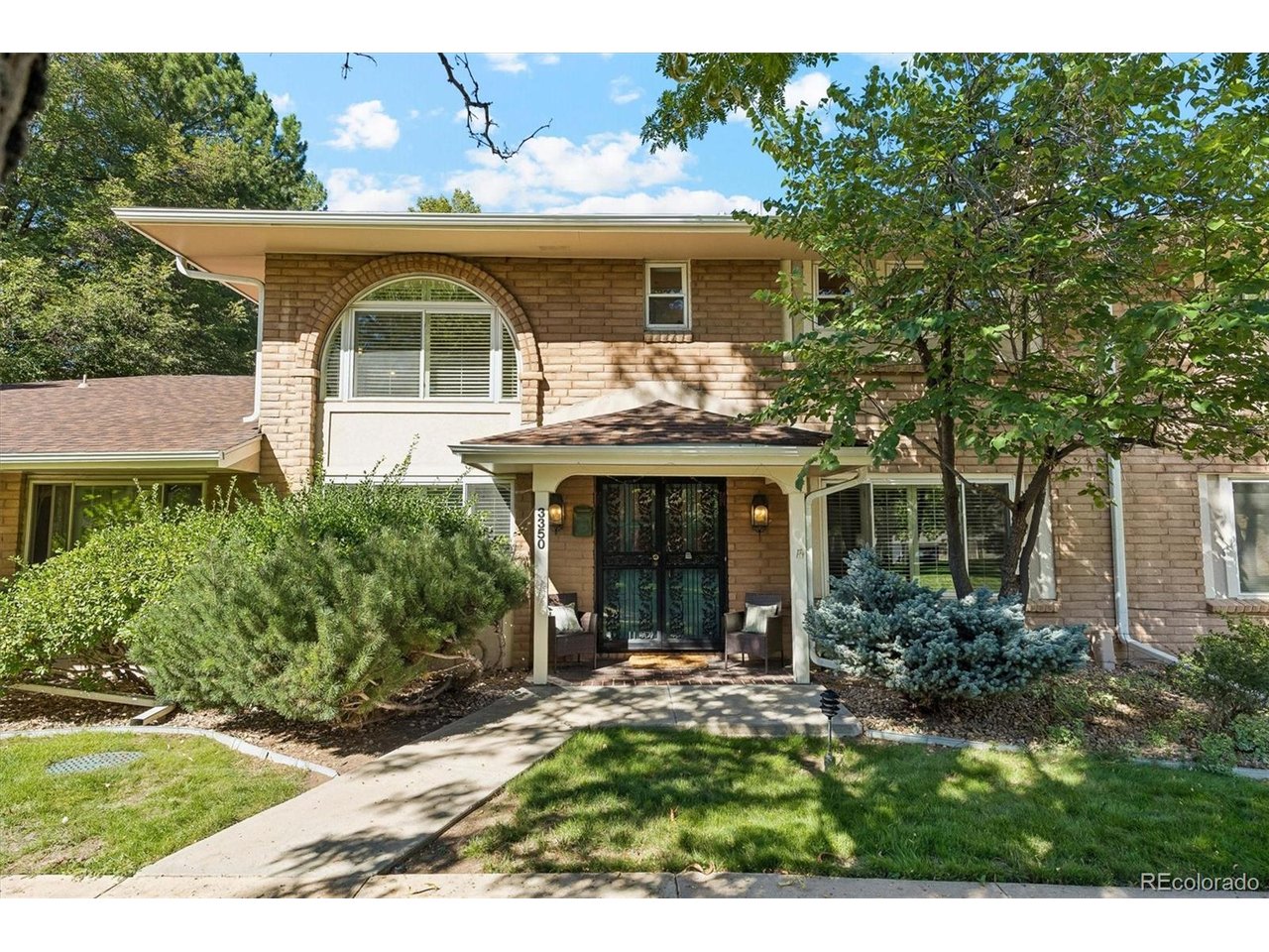 Spacious, beautifully maintained townhome in the quiet, beautifully landscaped Three Fountains community. One of the largest floor plans in the neighborhood, this home offers generously sized rooms, an unusually versatile layout and the feel of a single-family home with the convenience of low-maintenance living.A standout feature is the 13' x 13' completely private courtyard, with sliding-door access from both the living room and kitchen-an ideal space for outdoor dining, morning coffee or simply relaxing in your own private setting.The main level features a bright living and dining area, well-appointed kitchen with double oven and breakfast bar, plus a bedroom and 3/4 bath. Upstairs, two spacious bedroom suites each offer a private bath and walk-in closet. The primary suite includes a beautifully remodeled bathroom, while the two-story staircase is highlighted by original 1968 stained glass windows that add character and charm.The basement provides additional living, laundry and storage space. Recent improvements include newer windows and patio doors, plantation shutters, furnace, water heater and appliances.Dozens of retail shops and restaurants, along with the High Line Canal Trail, I-25 and light rail, are all less than a mile away.A rare combination of space, privacy, character and convenience in a sought-after low-maintenance community.