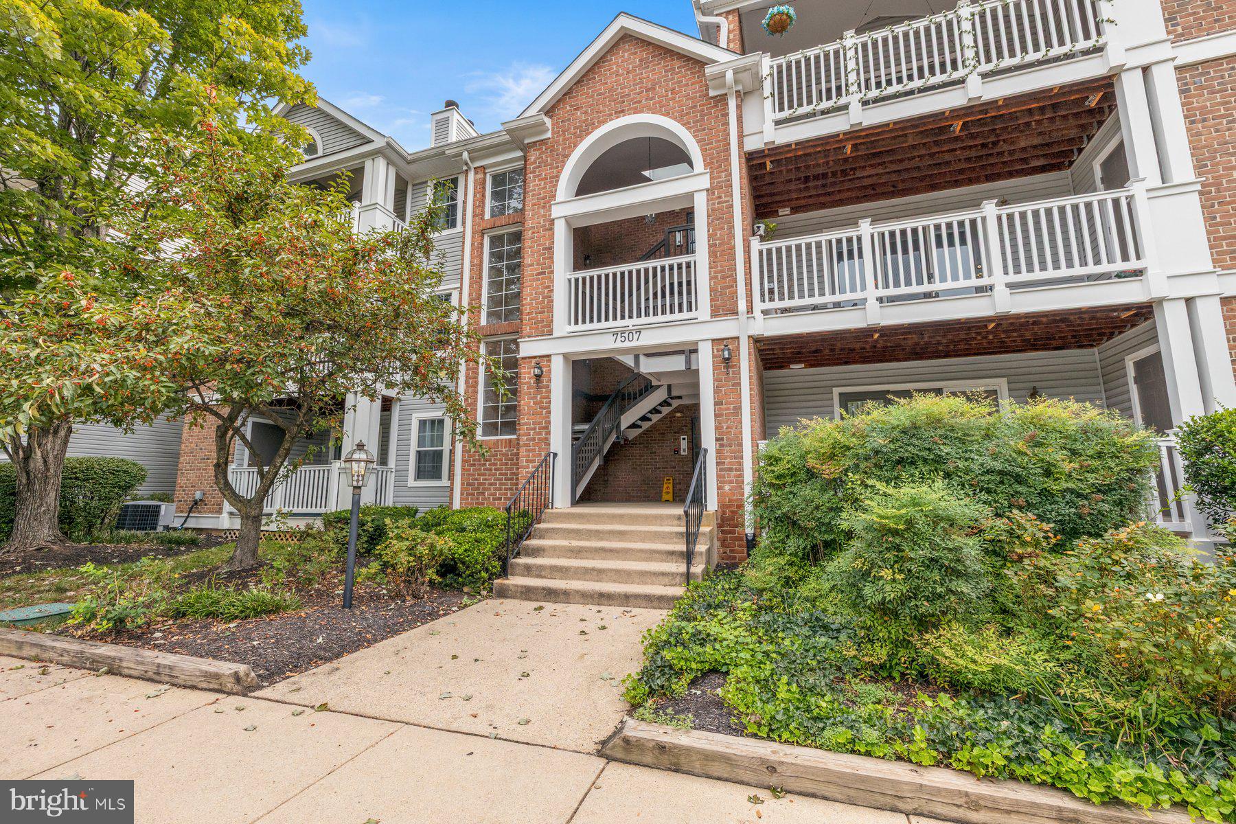Welcome to 7507 Ashby Ln located in the heart of Alexandria’s Kingstowne Community. This condo offers two bedrooms, two bathrooms, with plenty of natural light throughout. Located on the top floor with vaulted ceilings, the condo offers a wooded view that's hard to beat in the community.Inside, the spacious living area features a cozy fireplace and flows into the dining area, creating an easy open layout. The kitchen offers quartz countertops, under-mount lighting, plenty of cabinet space, and a breakfast bar for casual dining. Skylights bring in additional natural light throughout the home. The two bedrooms are separated by the living space for added privacy, and the primary bedroom includes an en-suite bathroom and a large closet. A private balcony overlooks a lush, wooded area, offering a quiet spot for morning coffee or evening relaxation.Recent updates include Energy-efficient windows (2024), HVAC (2020), primary bedroom closet (2022), new carpet (2022), deck (2022), hot water heater (2025), roof (2026), and skylights (2026).Zoned for Lane Elementary School, Hayfield Middle School, and Hayfield High School.Located in the heart of Kingstowne, residents enjoy access to community pools, tennis courts, fitness centers, and walking trails.This home offers an unbeatable commuter location with easy access to major routes including the Fairfax County Parkway, I-95, I-395, and I-495. Franconia-Springfield Metro Station is just minutes away, offering a direct connection into Washington D.C. Kingstowne Town Center is also close by, with shopping, dining, and entertainment options for everyday convenience.This top-floor condo offers space, updates, and a fantastic location all in one. Some photos are virtually staged. Make your appointment today!