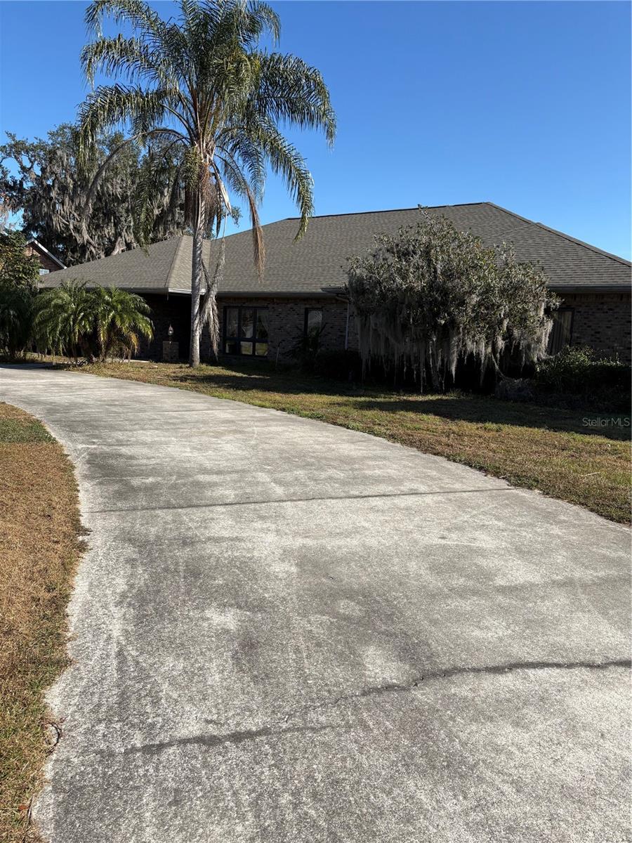Under contract-accepting backup offers. Short Sale. Great opportunity to have a home on the St. Johns River!  Location and View all in one!  This home has you going to bed watching the sun set through your windows and waking up to a beautiful sunrise in the morning!  This is Florida living at its finest!  This is a rare find home on the St. Johns River!  This home is situated on the river which goes out ot the intercoastal waterway.  This 4 bedroom/4 bath poolhome is ready for its new owners to enjoy life on the Florida waterway!  Beautiful kitchen with granite countertops, island and custom cabinets, double oven all that overlook the family room and has views of the pool and the river.  Tons of natural light throughout the home, 12' ceilings throughout the home,  A little area with a small beach for wading in the water, and a dock and boat lift to store some of your toys!  This home has 2 garages, one of which was turned into a studio efficiency which can be used to rent out or have a place for your guest to stay.